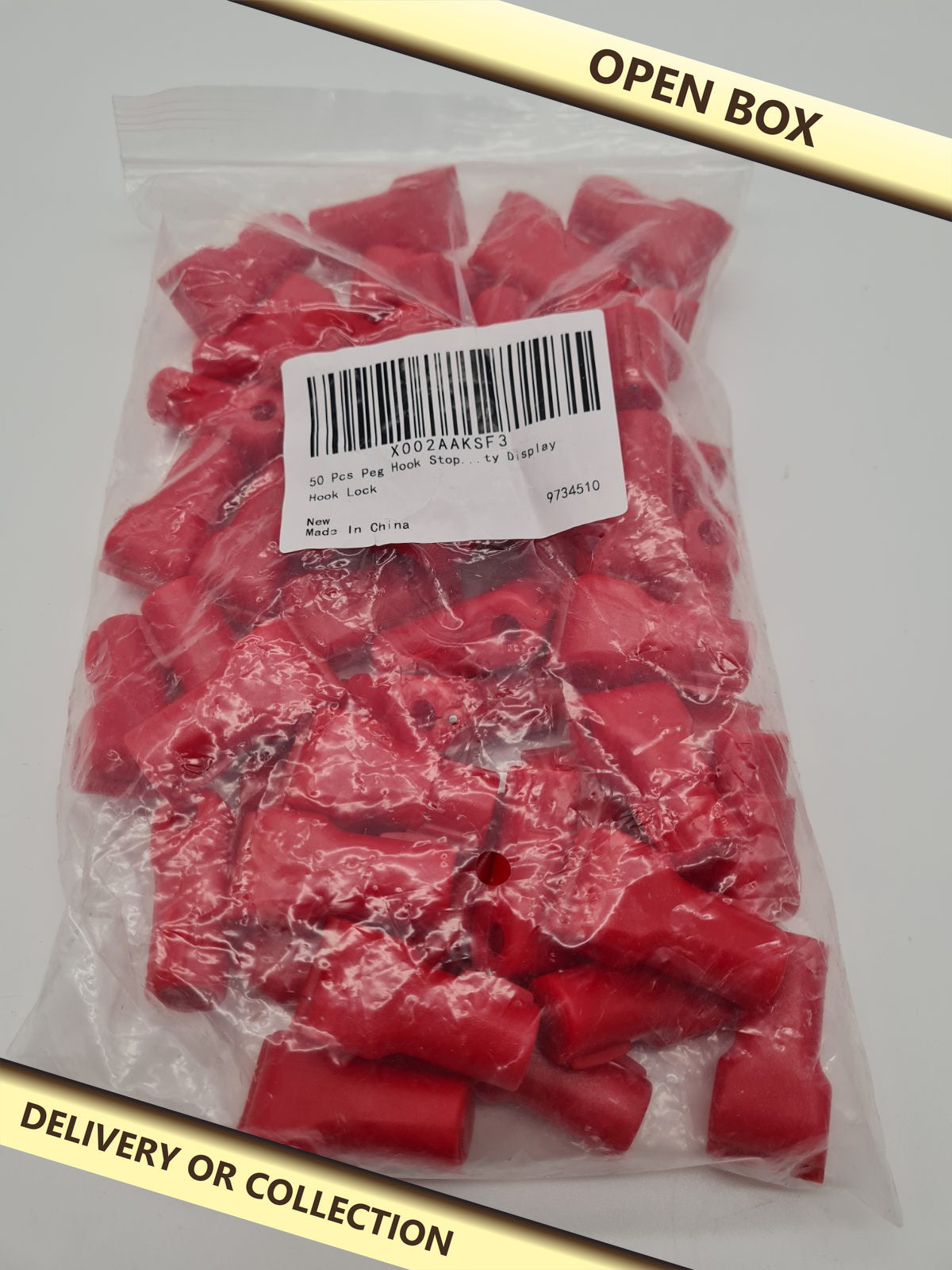 Retail Display Peg Hook Locks — photograph 1 — Open box; auction delivery information shown on image