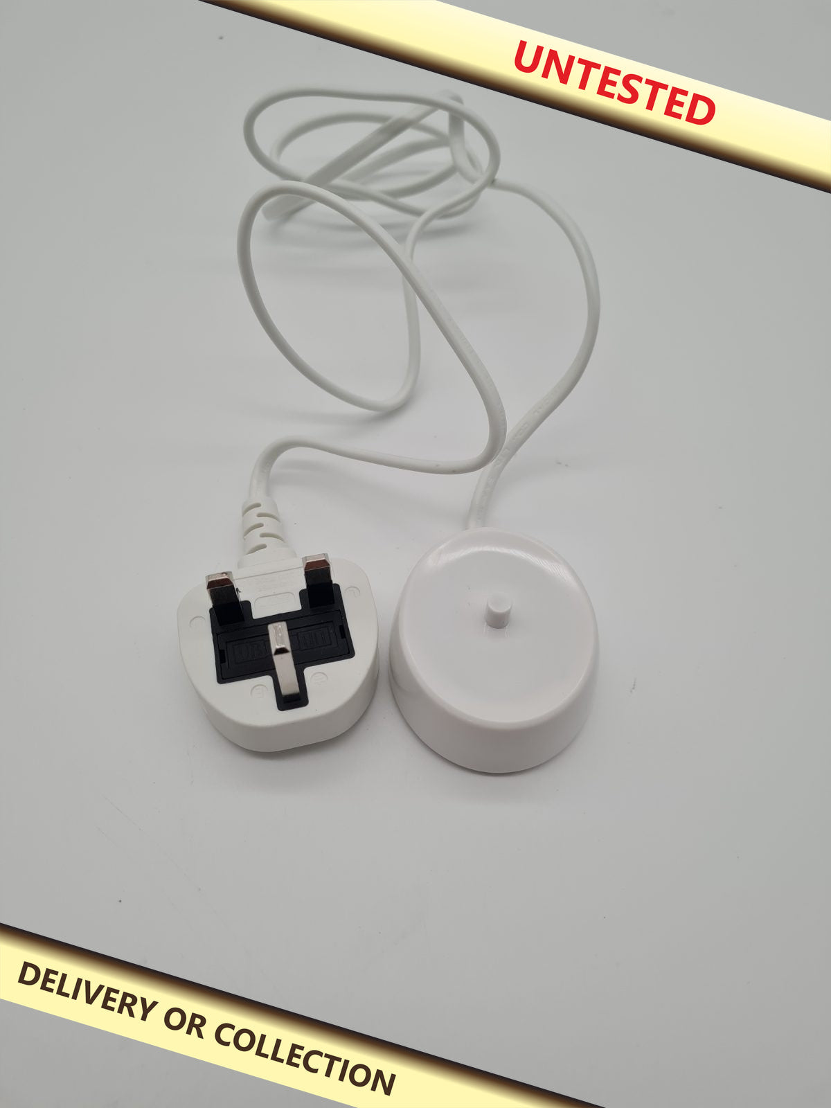 Inductive Charging Base — photograph 1 — Untested; auction delivery information shown on image