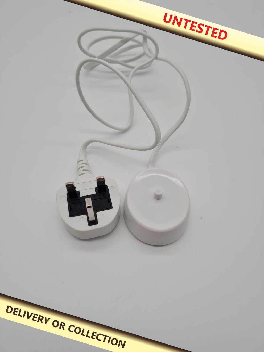 Inductive Charging Base — photograph 1 — Untested; auction delivery information shown on image