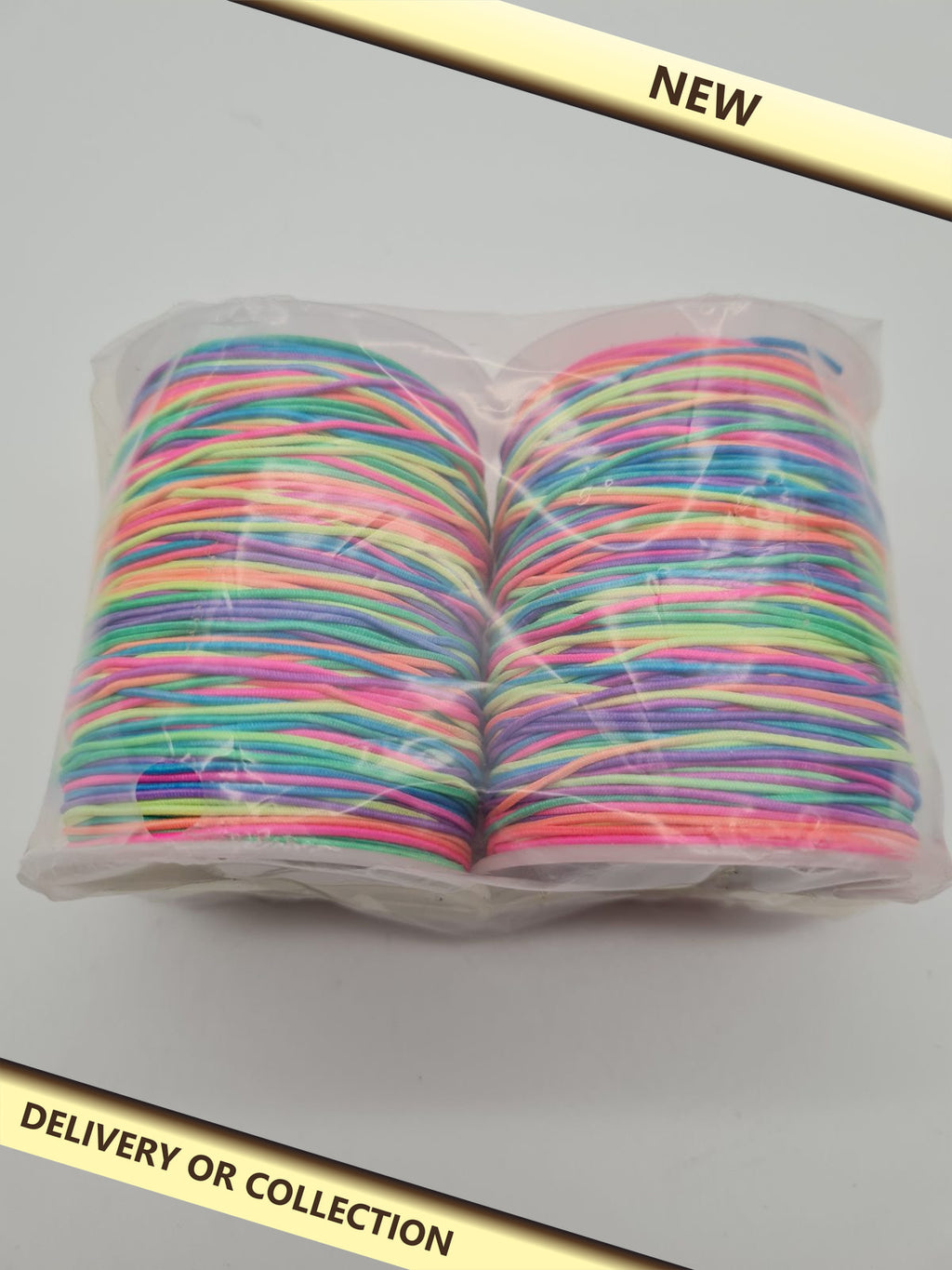 Multicoloured craft cord – 2 rolls — photograph 1 — New; auction delivery information shown on image