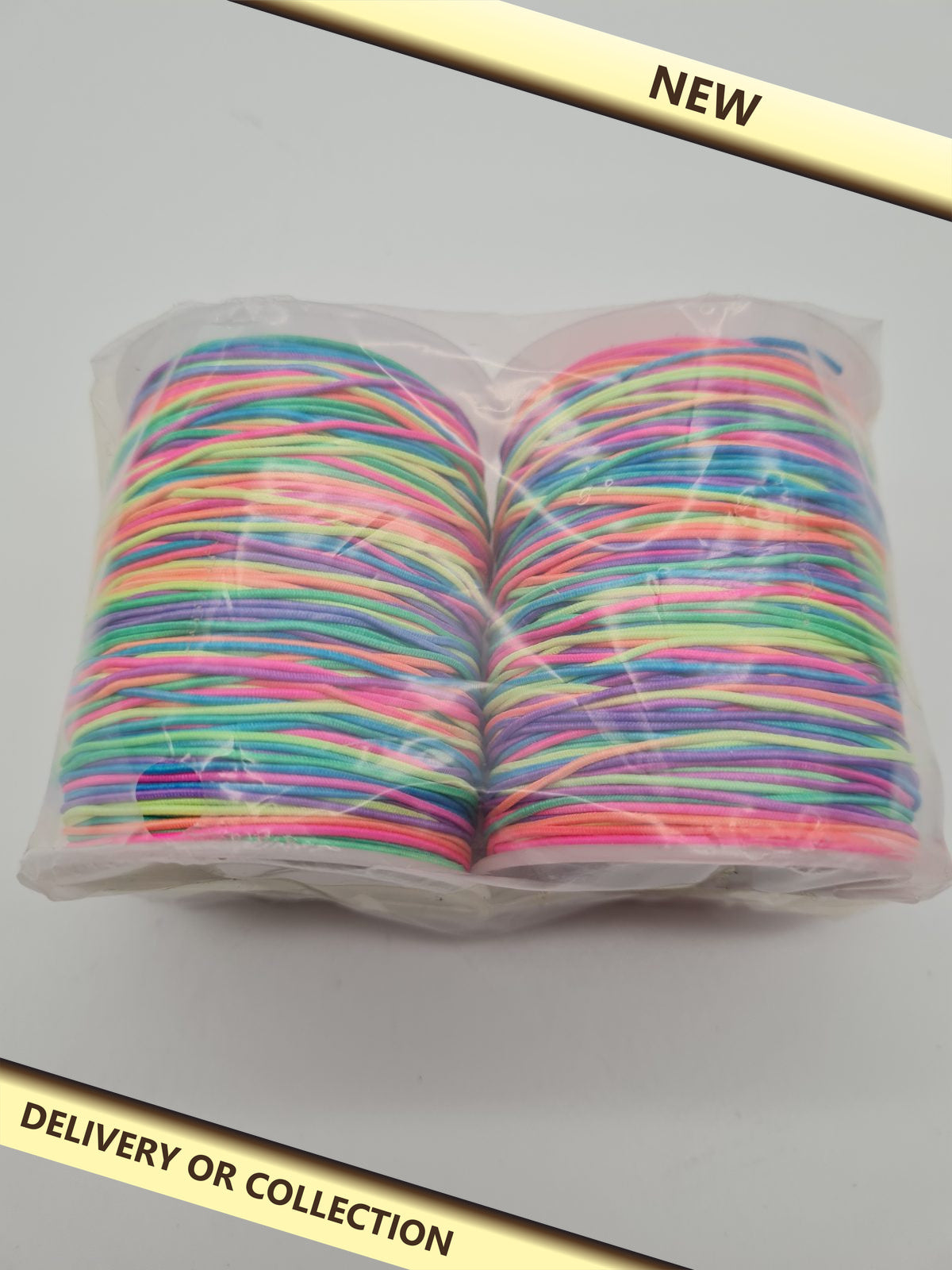 Multicoloured craft cord – 2 rolls — photograph 1 — New; auction delivery information shown on image