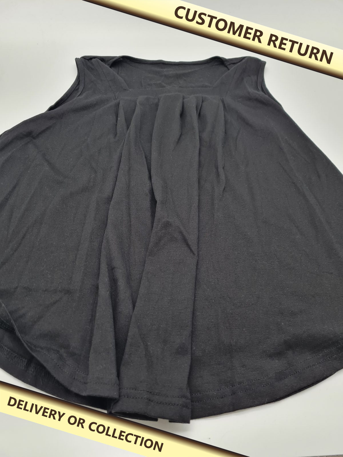 Sleeveless pleated-front top size XL — photograph 1 — Customer return; auction delivery information shown on image