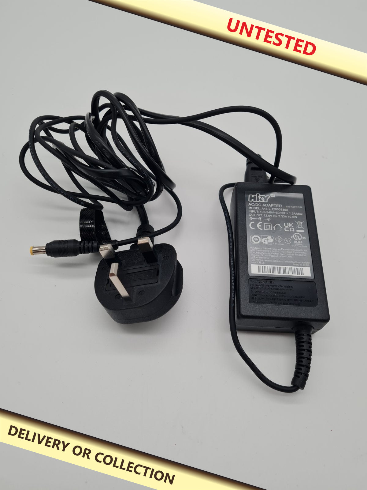 AC/DC Power Adapter A48-2-12000330 — photograph 1 — Untested; auction delivery information shown on image