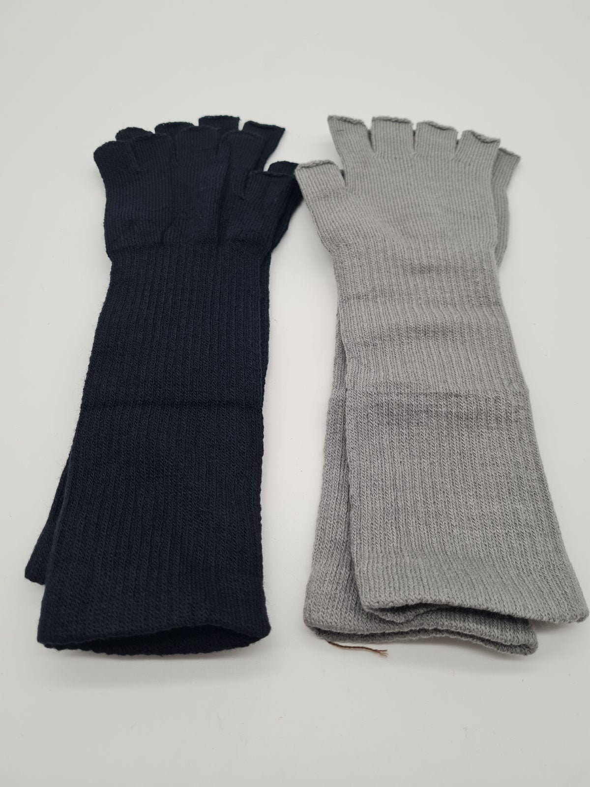 Two Pairs of Long Knitted Fingerless Gloves — photograph 1
