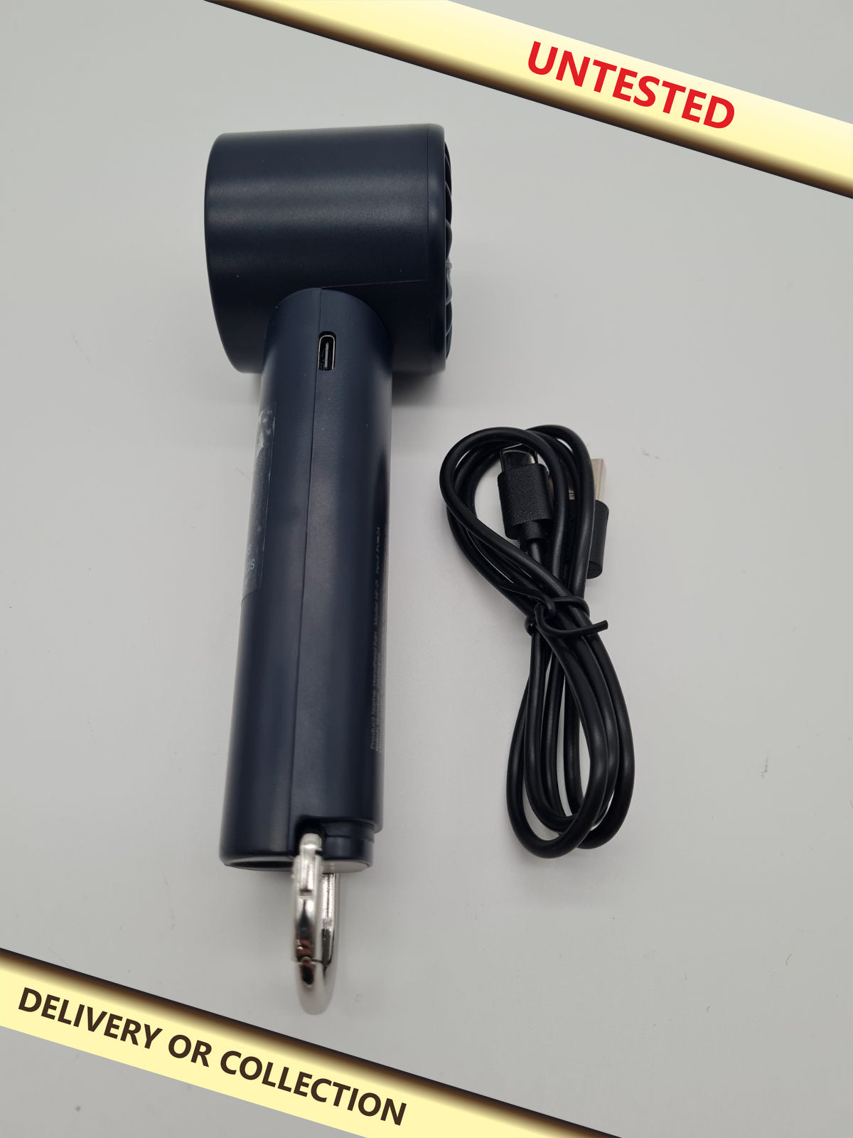 Handheld rechargeable fan HF-01 — photograph 1 — Untested; auction delivery information shown on image