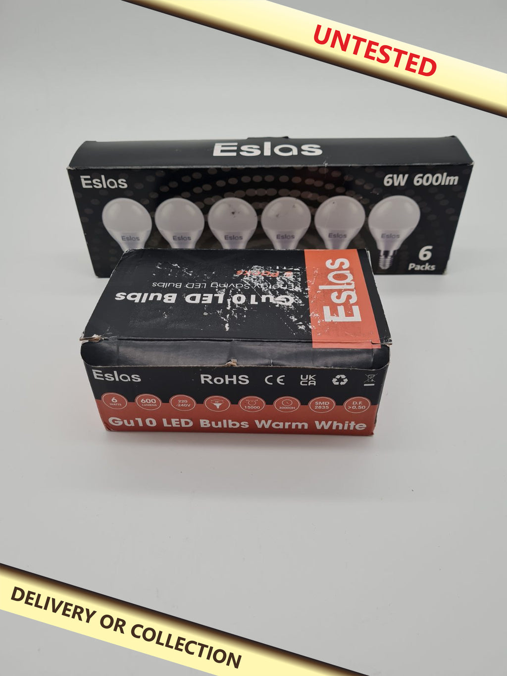 2 packs of lightbulbs 6 in each box — photograph 1 — Untested; auction delivery information shown on image