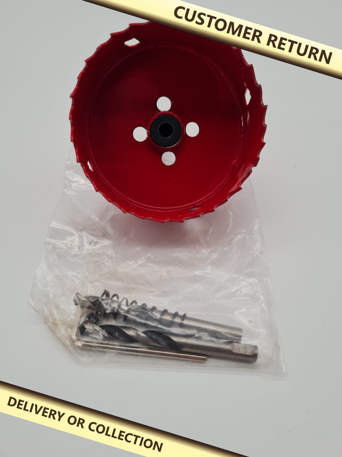 Hole Saw Kit — photograph 1 — Customer return; auction delivery information shown on image