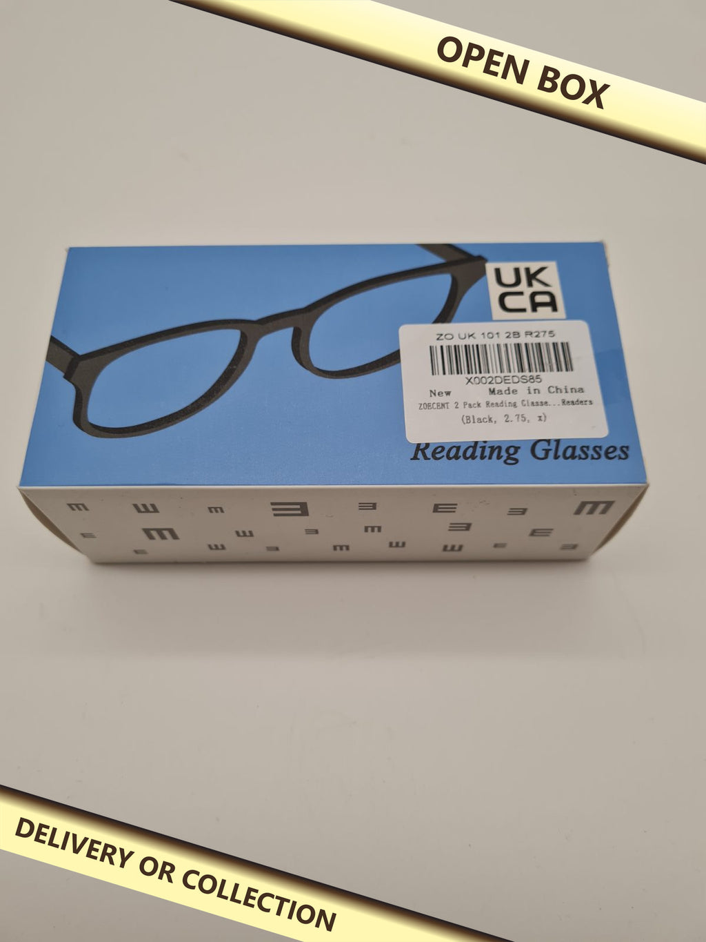 2-Pack +2.75 Reading Glasses — photograph 1 — Open box; auction delivery information shown on image