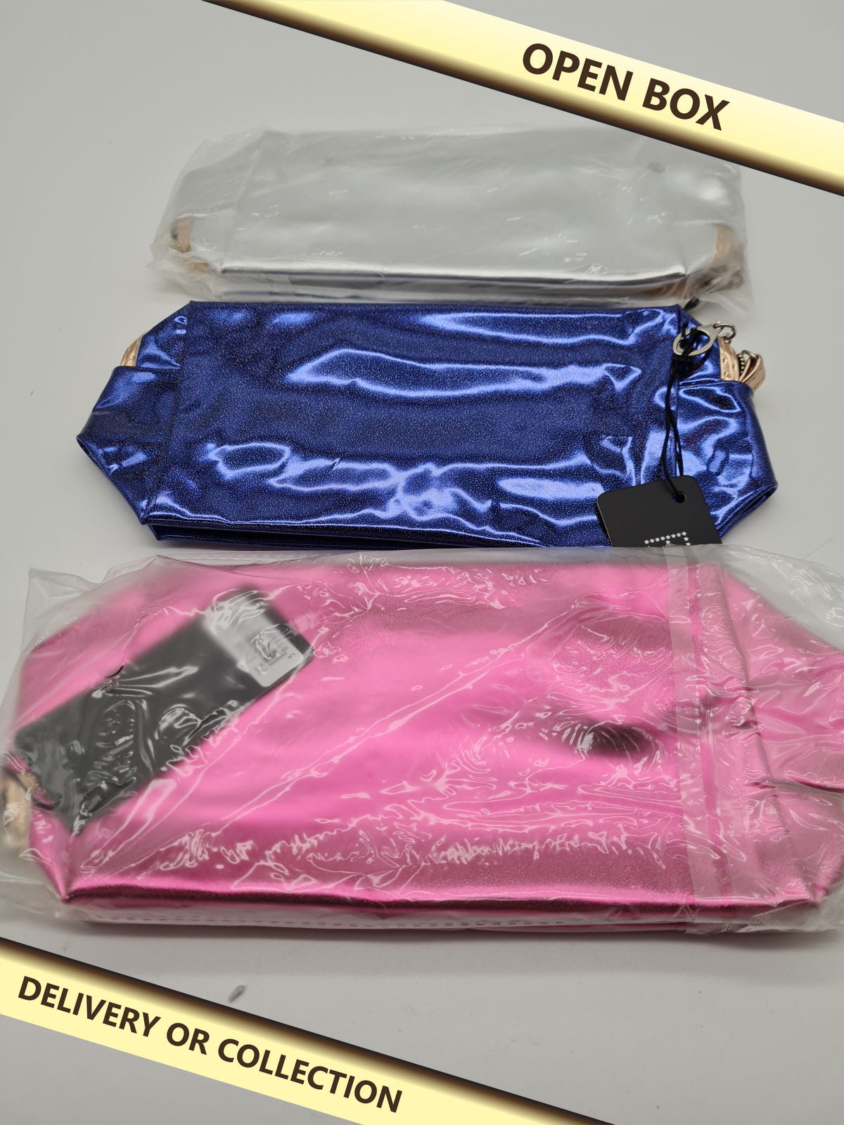 3 pack of metallic-effect make up bags — photograph 1 — Open box; auction delivery information shown on image