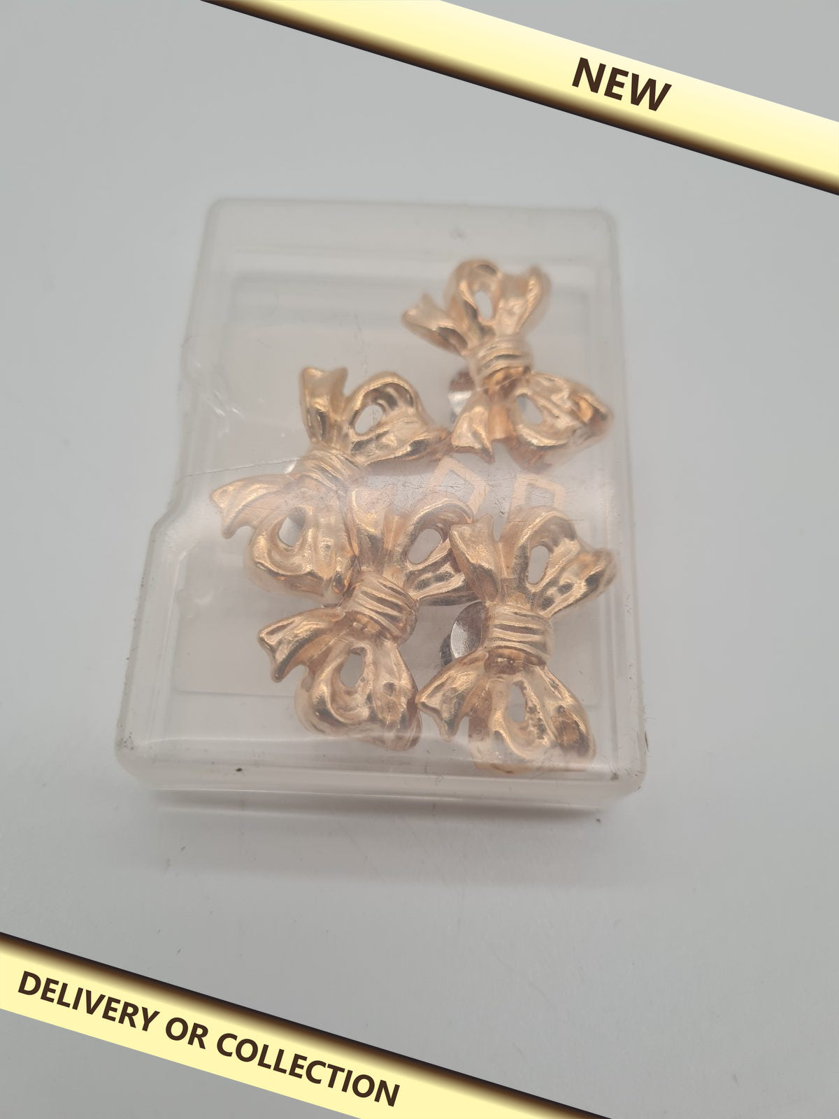 Bow-Shaped No-Sew Waist Tightener Button Set — photograph 1 — New; auction delivery information shown on image