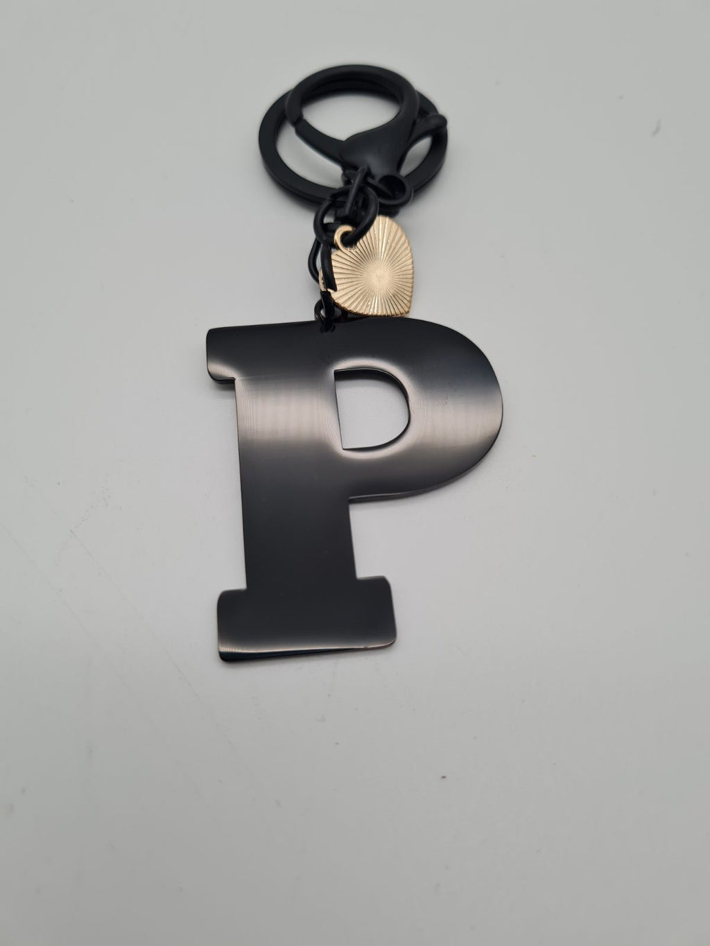 Letter P initial keyring and bag charm — photograph 2