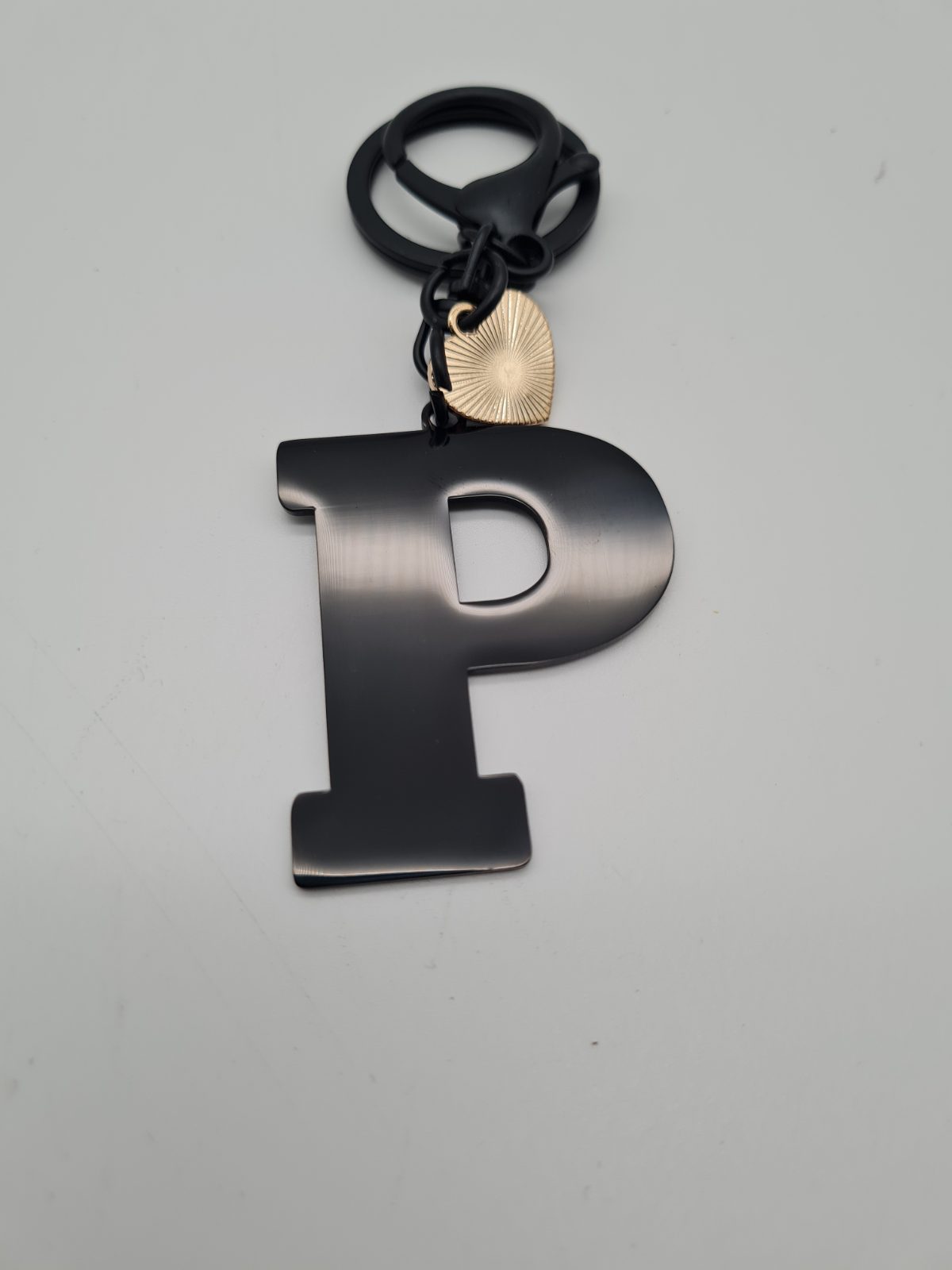 Letter P initial keyring and bag charm — photograph 2