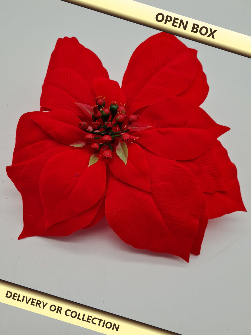 Artificial poinsettia flower decorations — photograph 1 — Open box; auction delivery information shown on image