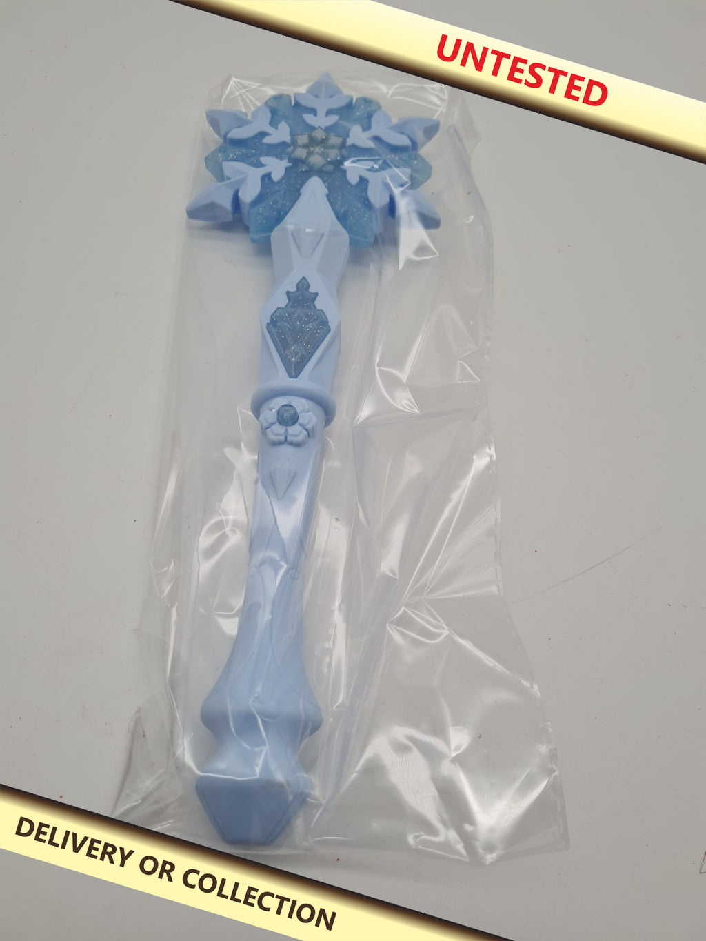 Snowflake Light-Up Toy Wand MF40 — photograph 1 — Untested; auction delivery information shown on image