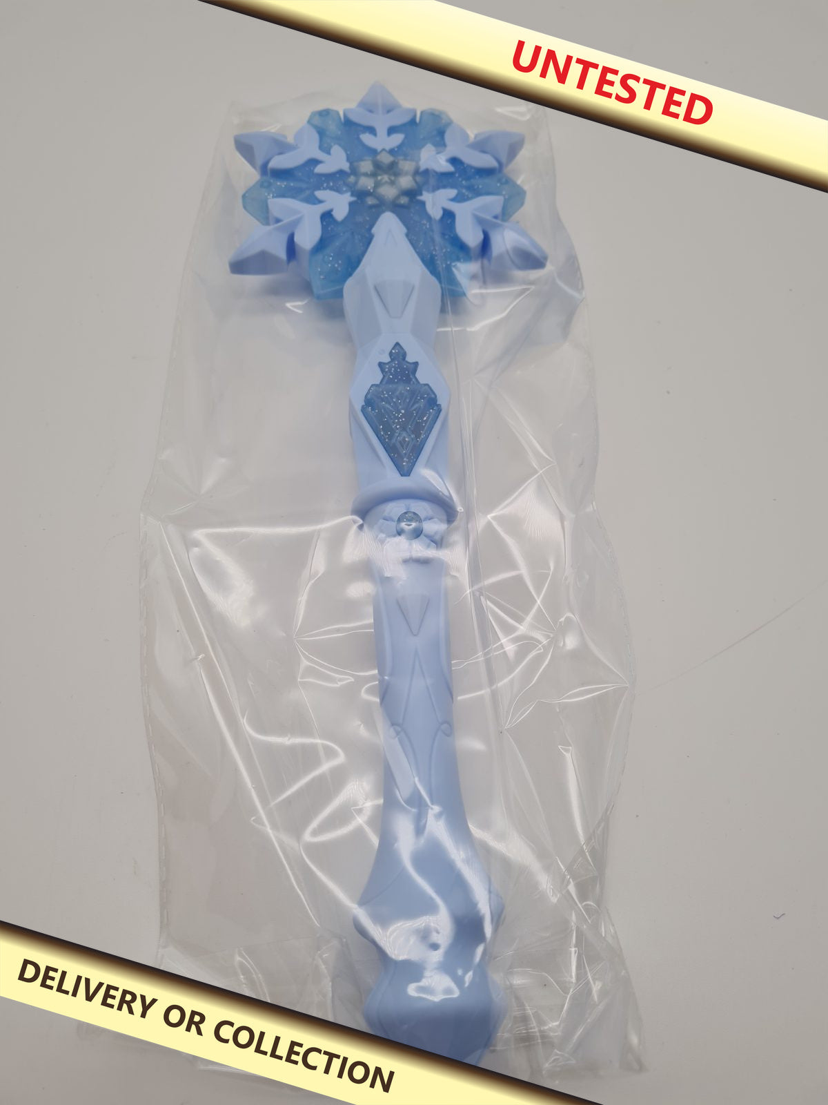 Snowflake Light-Up Toy Wand MF40 — photograph 1 — Untested; auction delivery information shown on image