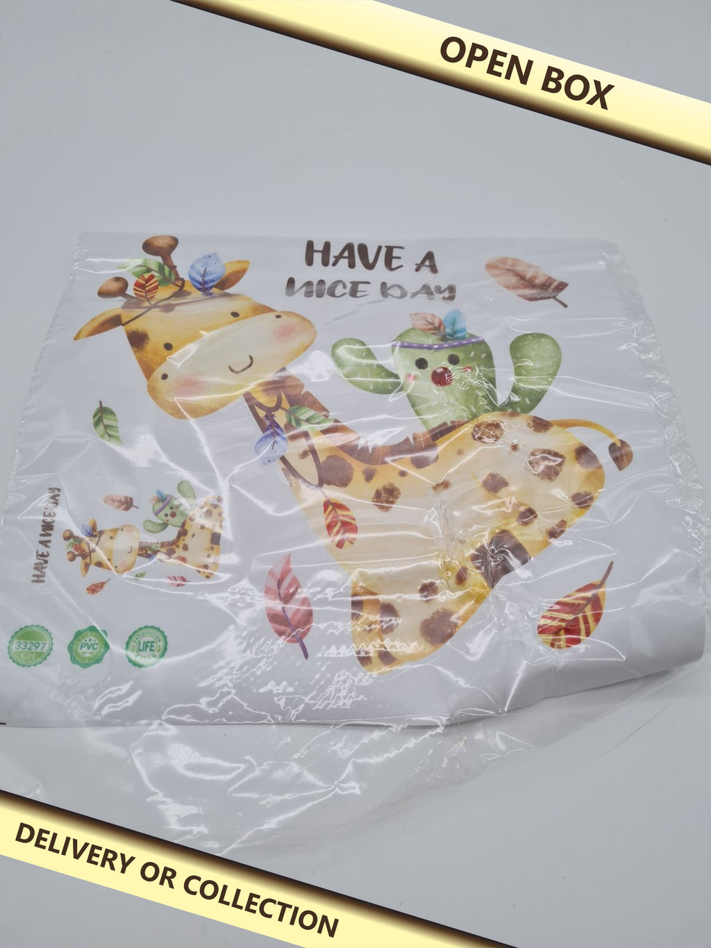 Children's Giraffe and Cactus Wall Sticker — photograph 1 — Open box; auction delivery information shown on image