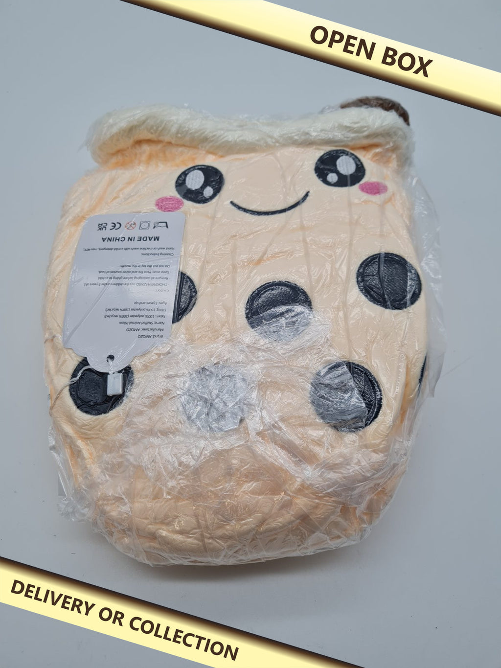 AMOZO Stuffed Animal Pillow — photograph 1 — Open box; auction delivery information shown on image