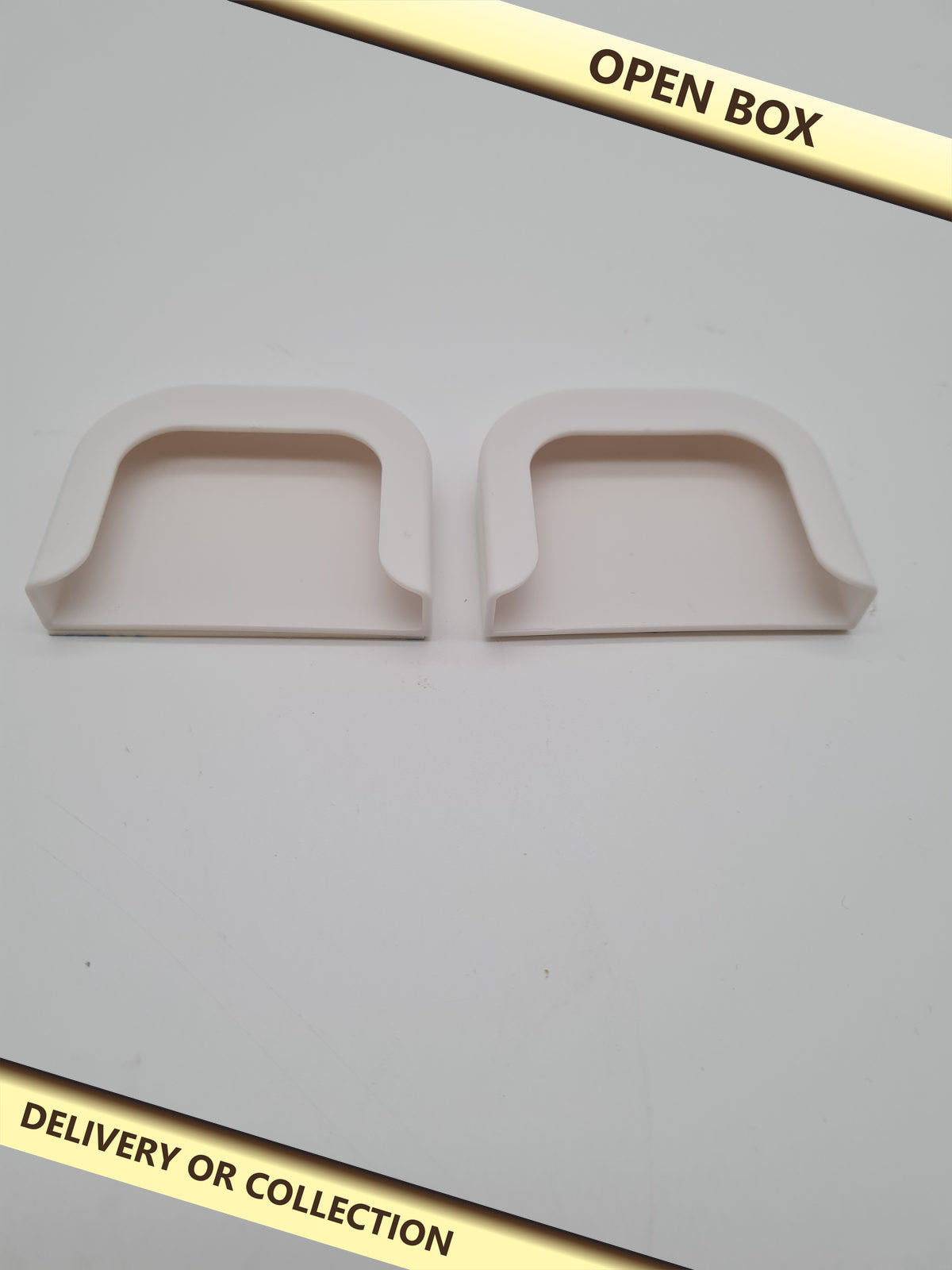Hikio adhesive camera wall mount brackets, 2 pack — photograph 1 — Open box; auction delivery information shown on image
