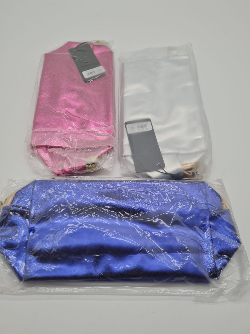 3 pack ofMetallic zip cosmetic bag — photograph 1
