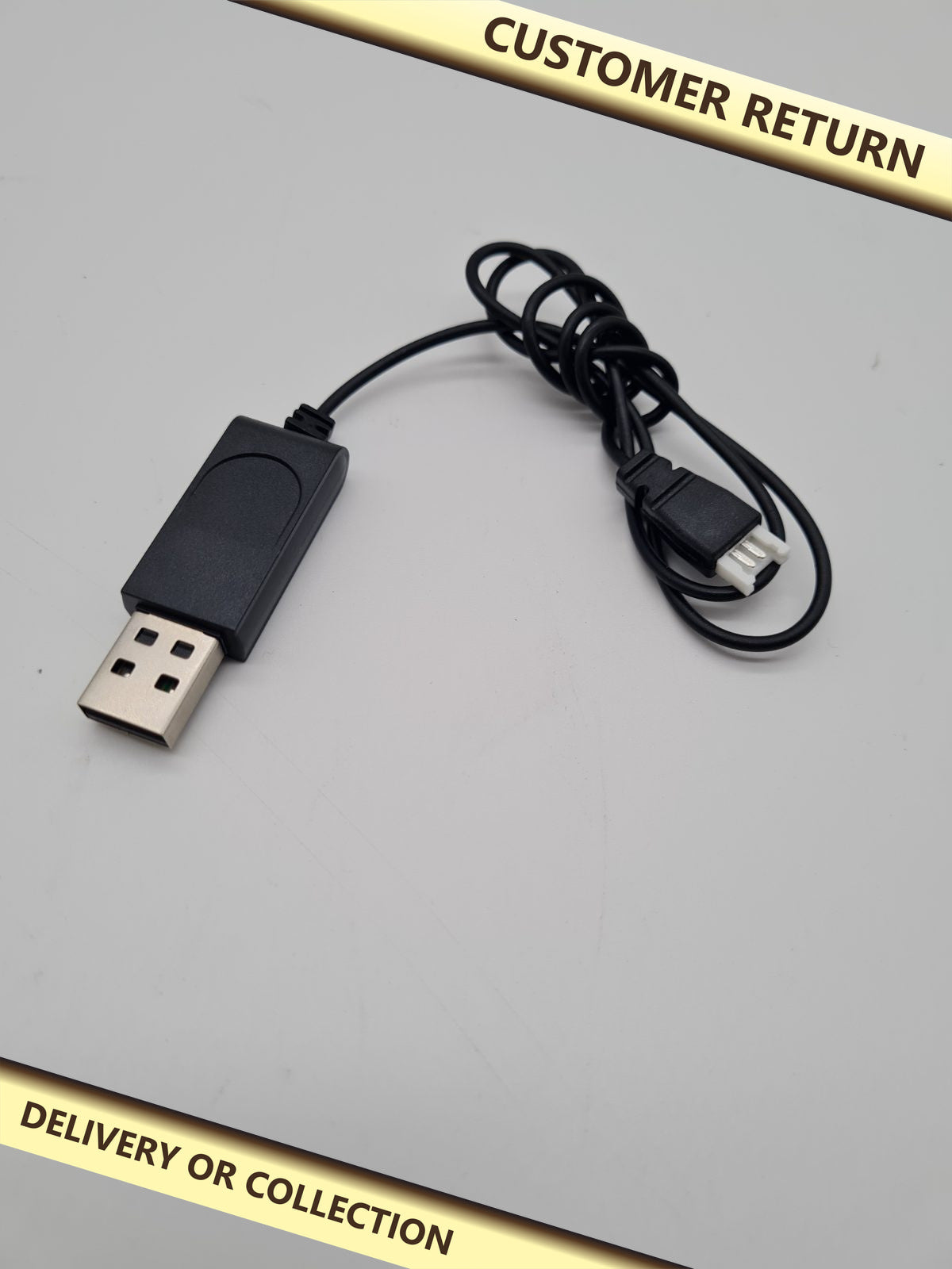 USB Battery Charger Cable with 2-Pin Connector — photograph 1 — Customer return; auction delivery information shown on image