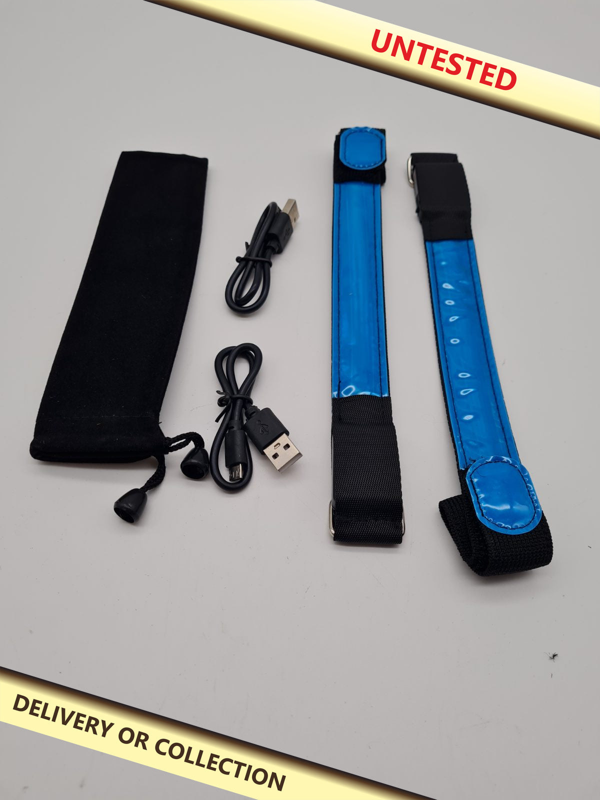 Pair of rechargeable elastic LED armbands — photograph 1 — Untested; auction delivery information shown on image