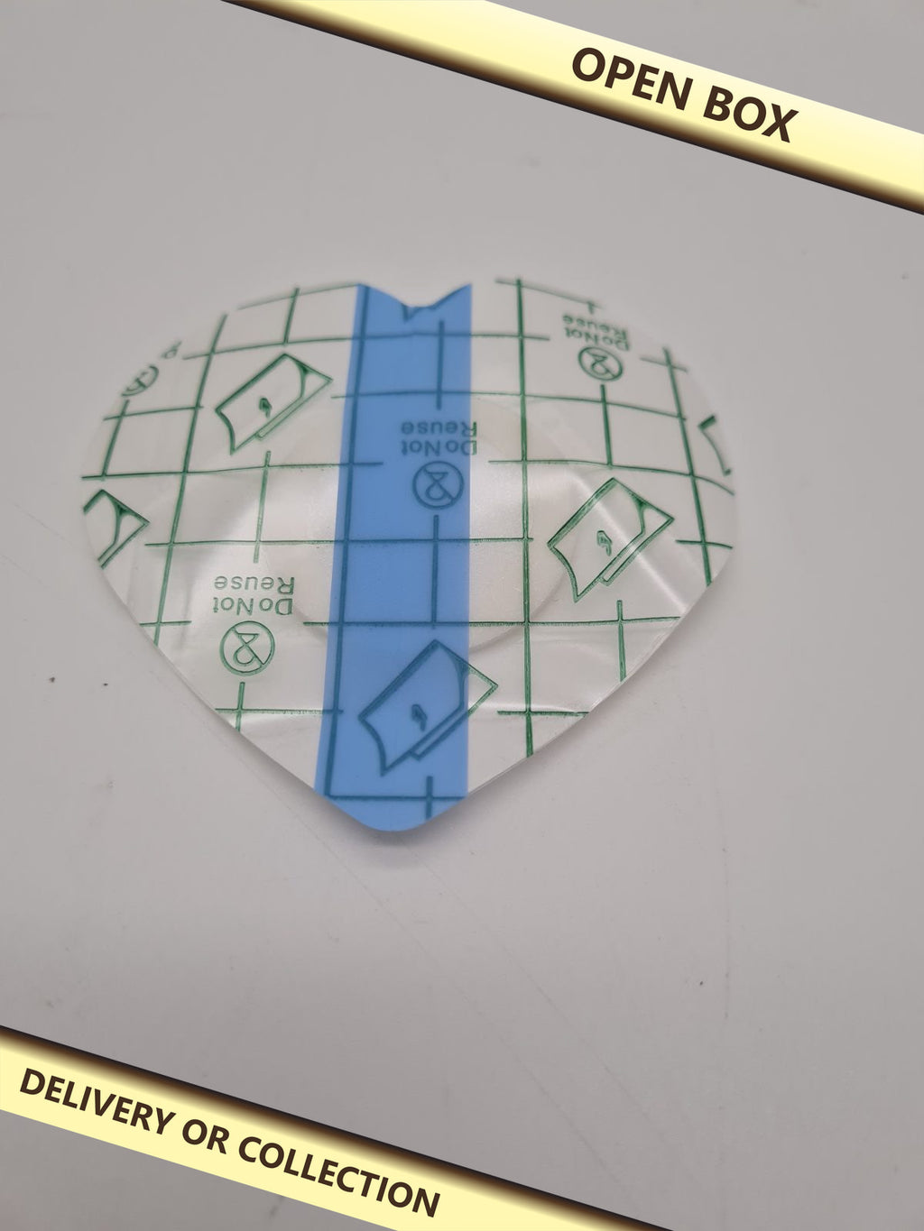Heart-Shaped Belly Button Castor Oil Patches — photograph 1 — Open box; auction delivery information shown on image