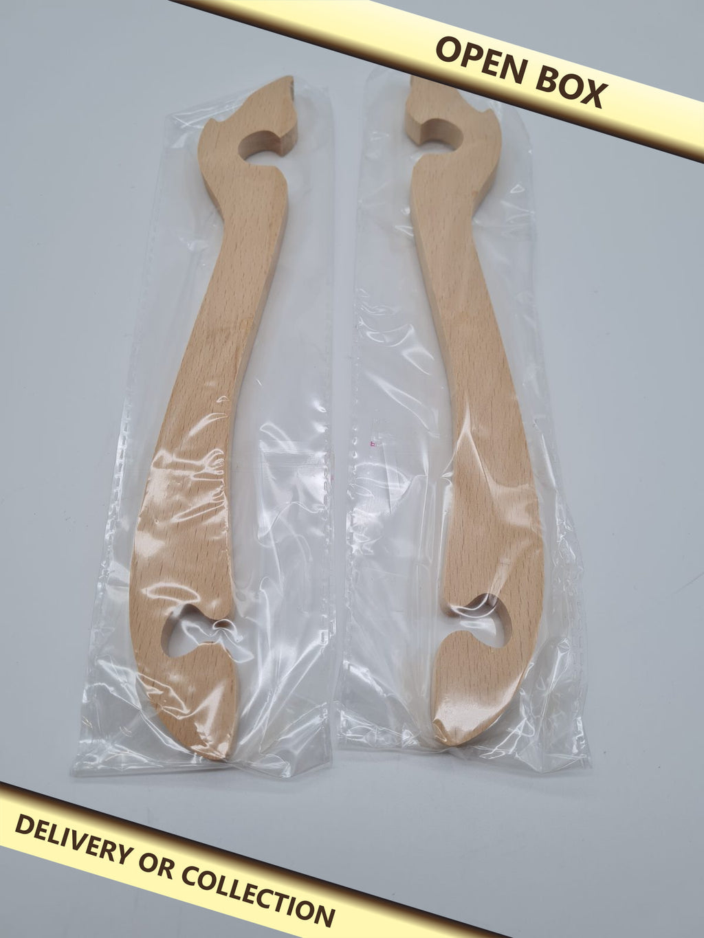 Wooden oven rack pullers - pair — photograph 1 — Open box; auction delivery information shown on image