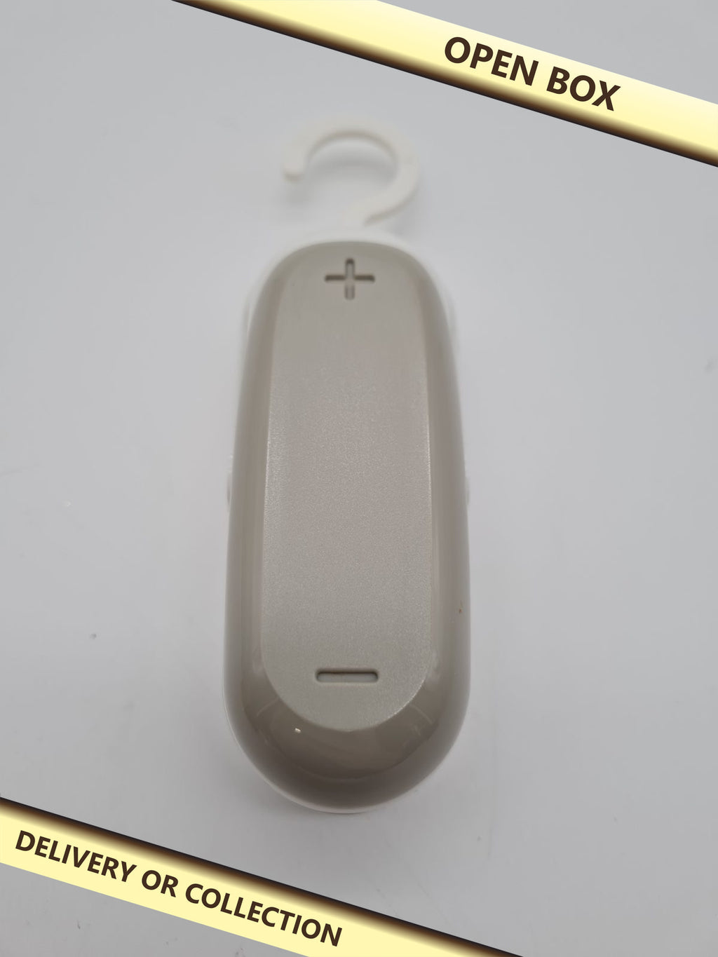 Handheld Mini Bag Sealer — photograph 1 — Open box; auction delivery information shown on image