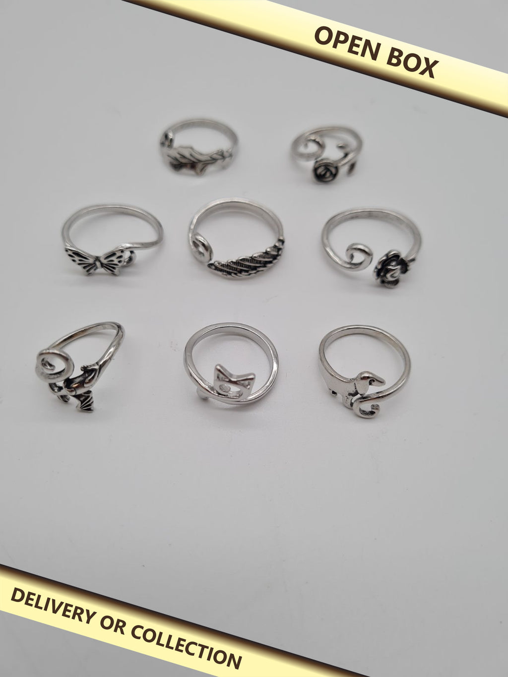 Set of 8 Adjustable Crochet Tension Rings — photograph 1 — Open box; auction delivery information shown on image