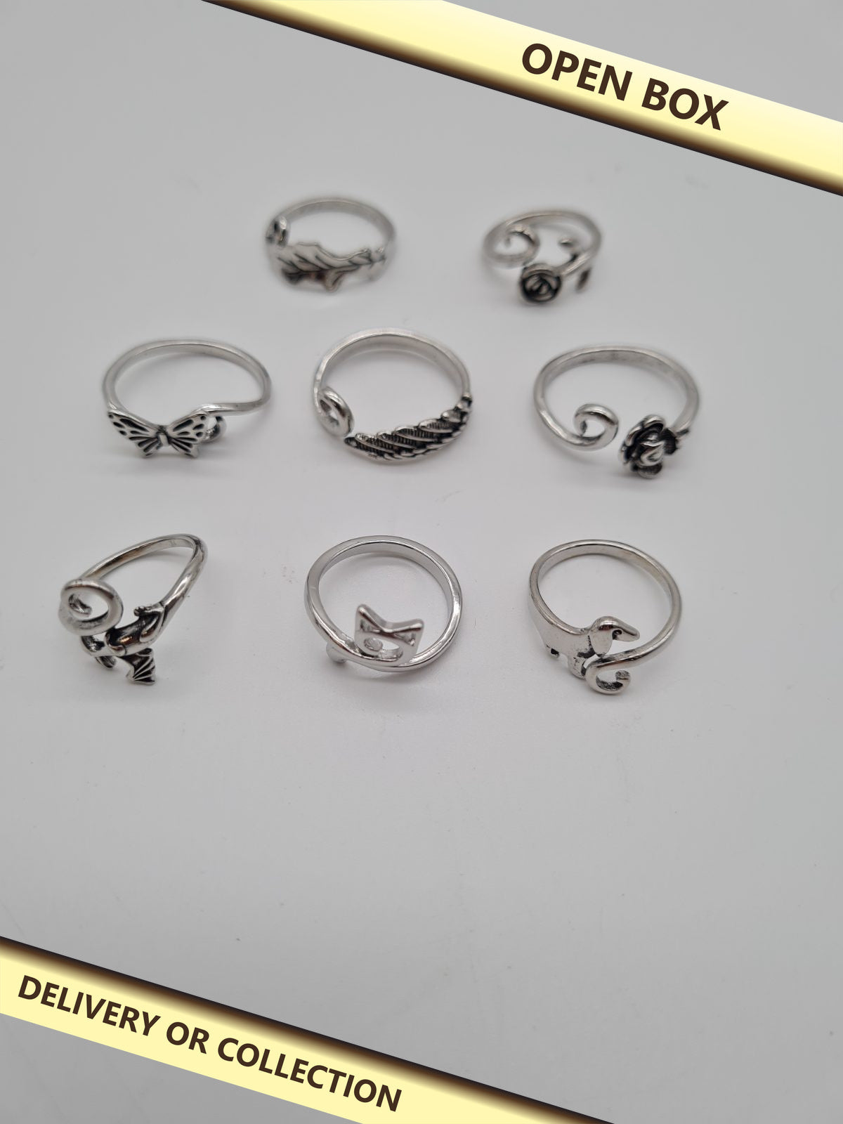 Set of 8 Adjustable Crochet Tension Rings — photograph 1 — Open box; auction delivery information shown on image