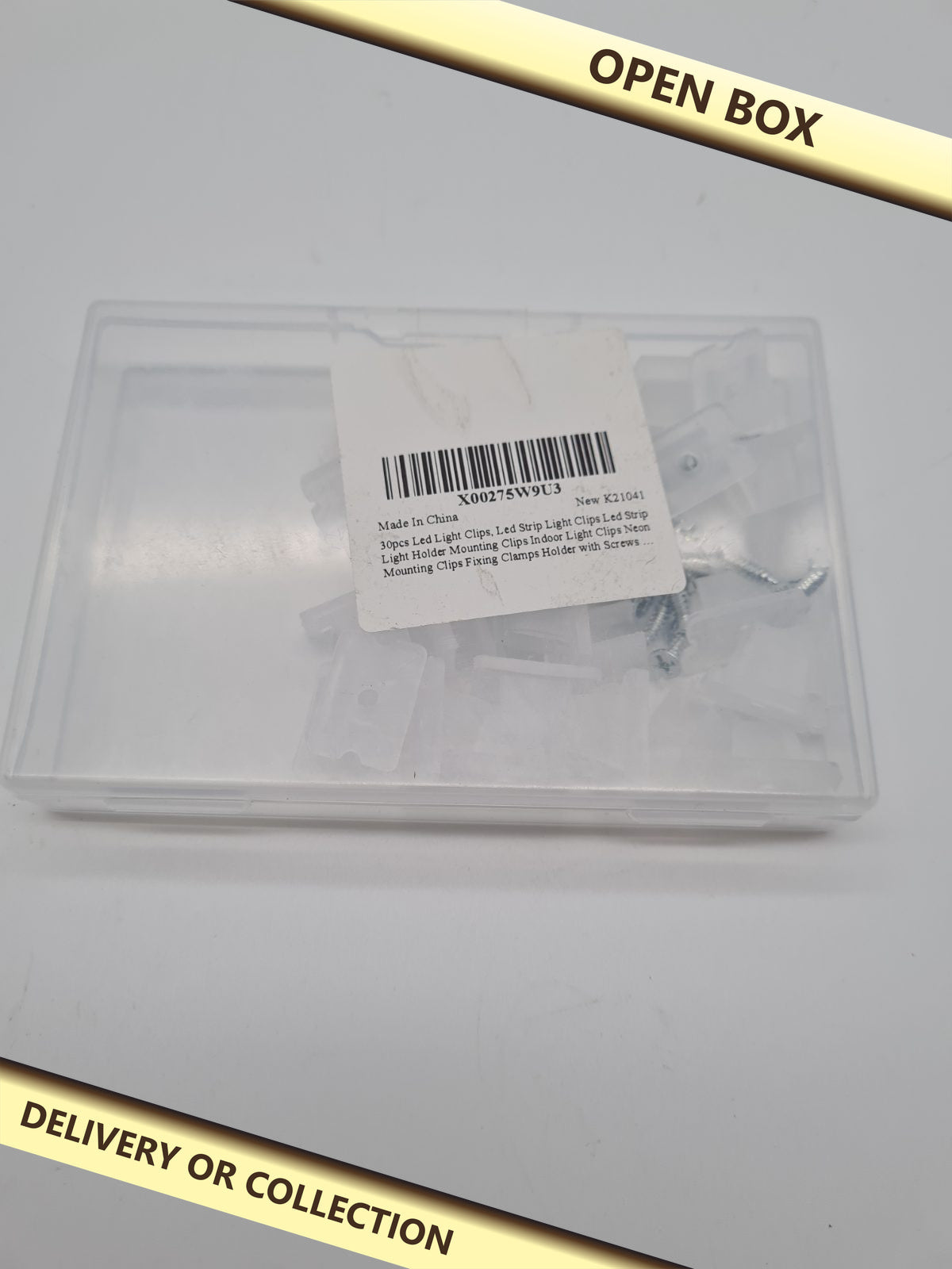 LED Strip Light Mounting Clips and Screws — photograph 1 — Open box; auction delivery information shown on image