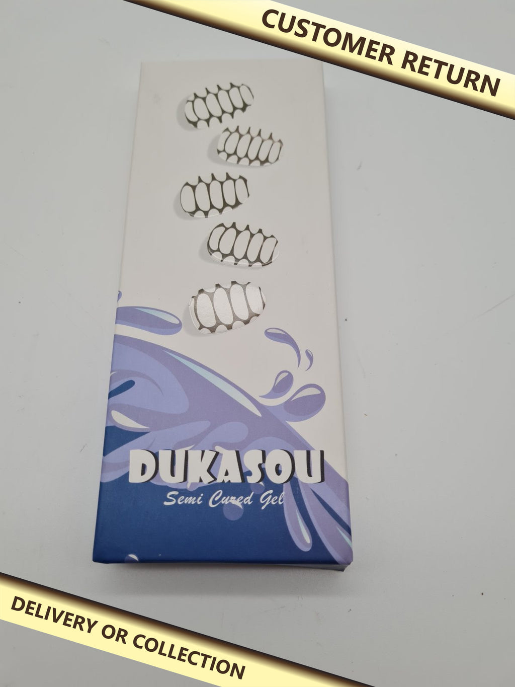 Semi-Cured Gel Nail Strips black and white — photograph 1 — Customer return; auction delivery information shown on image