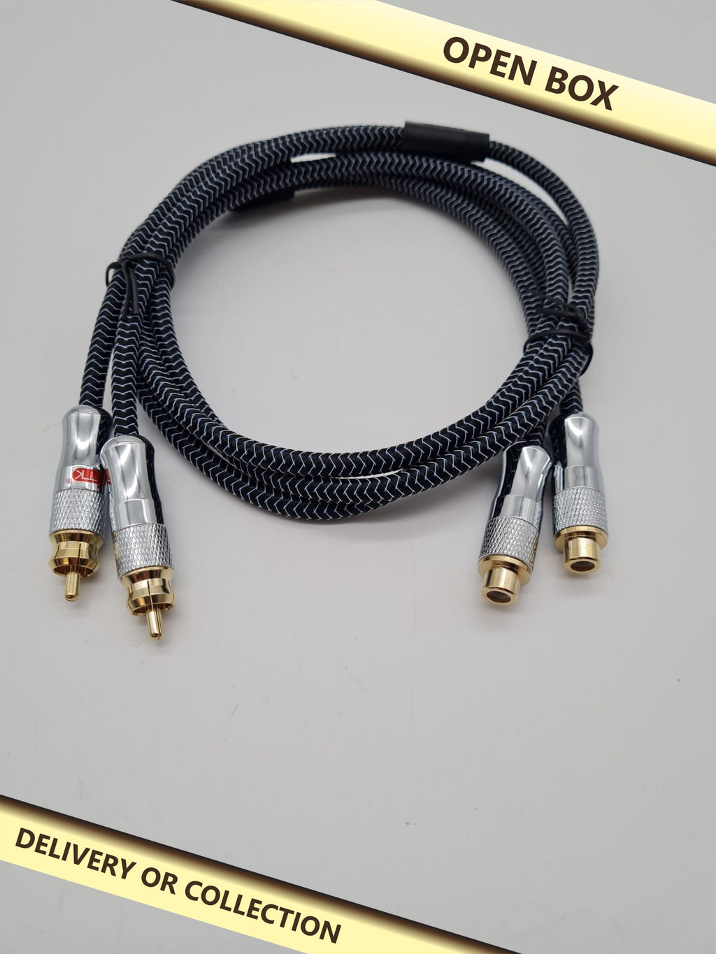 Stereo RCA Extension Cable EM-02RC — photograph 1 — Open box; auction delivery information shown on image