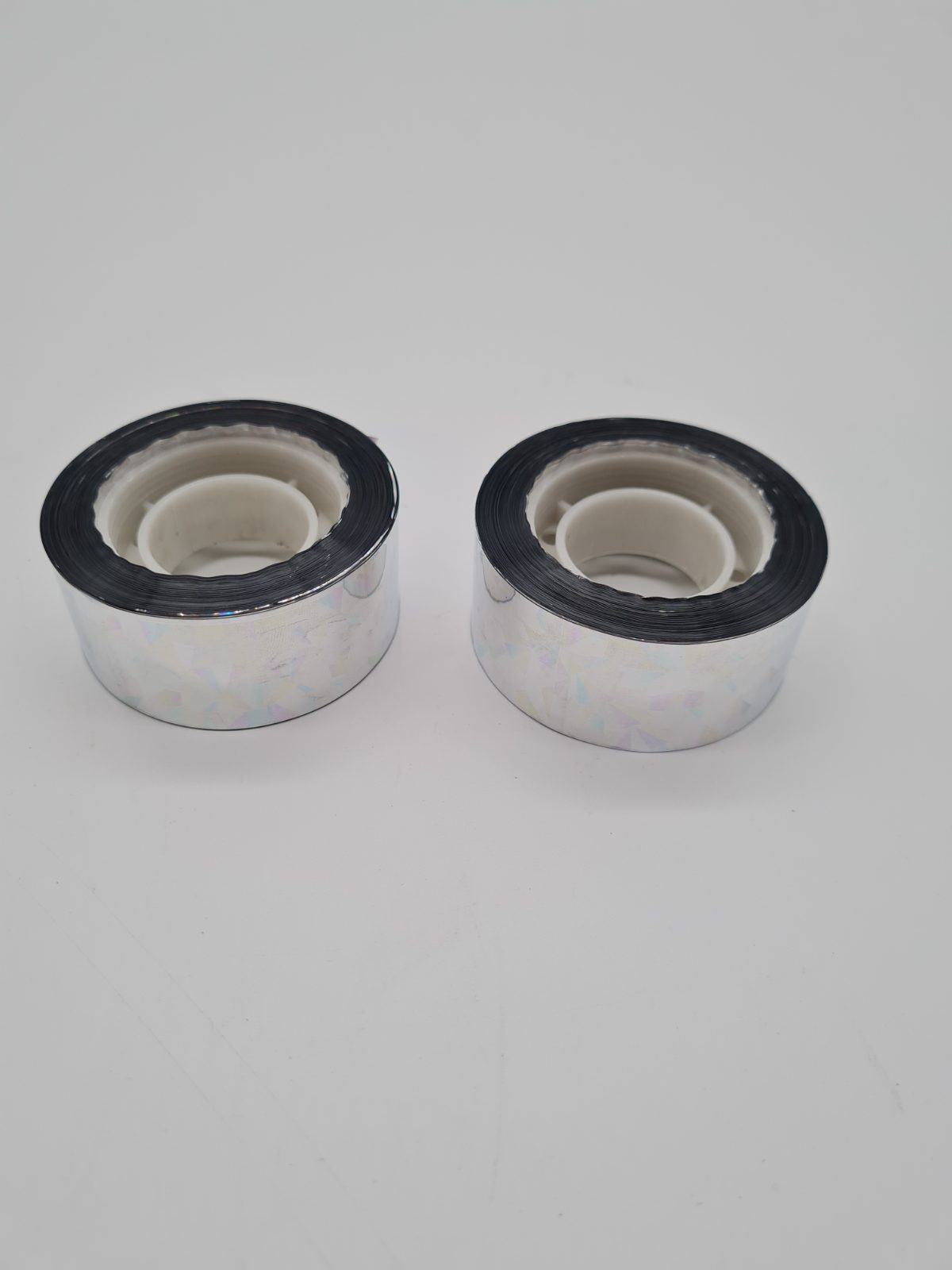Two rolls of holographic reflective tape. — photograph 2