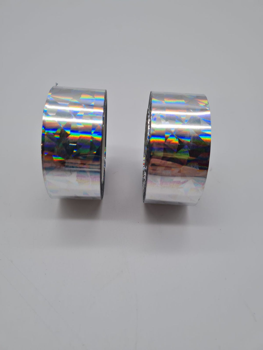 Two rolls of holographic reflective tape. — photograph 1