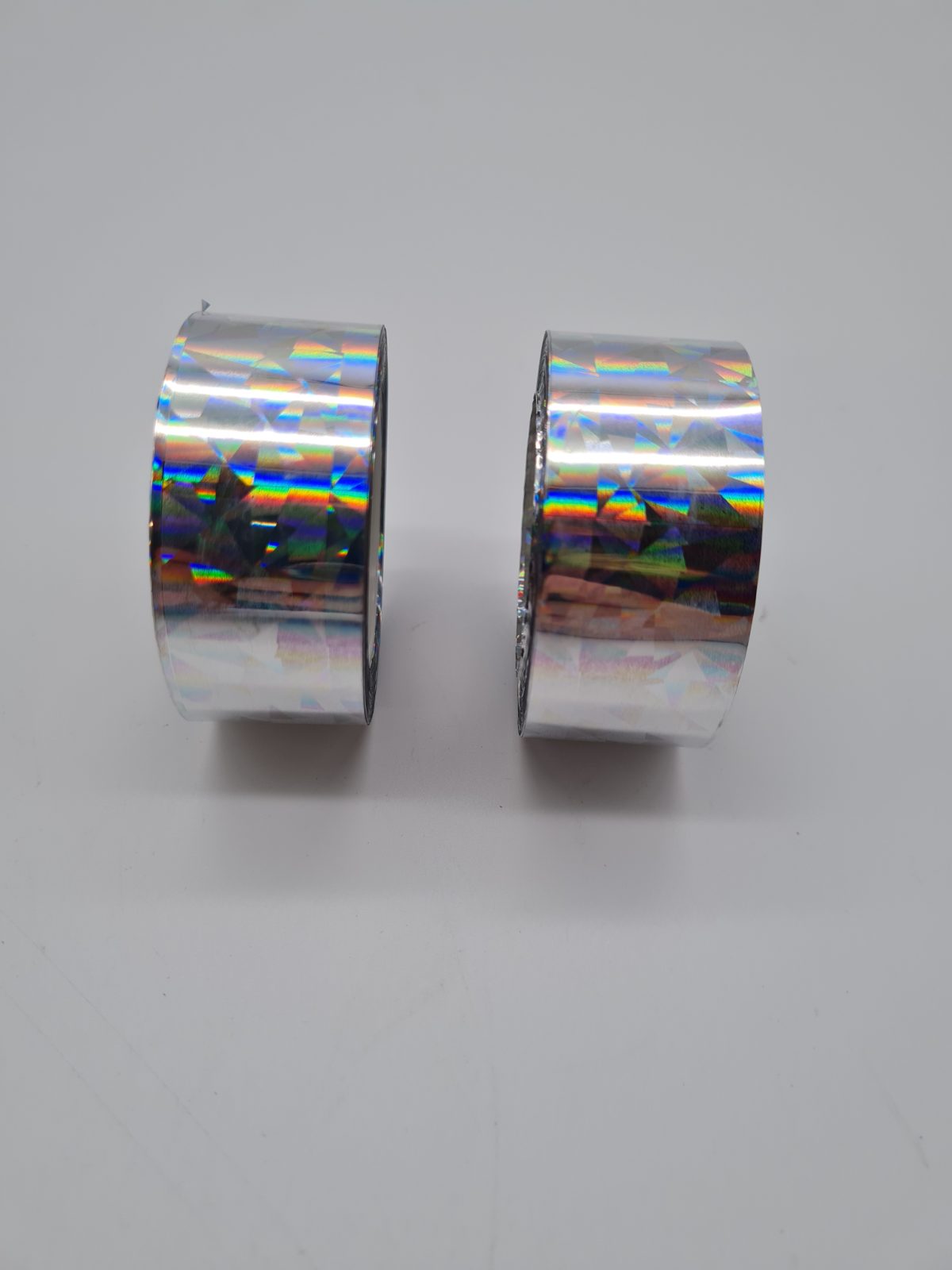 Two rolls of holographic reflective tape. — photograph 1
