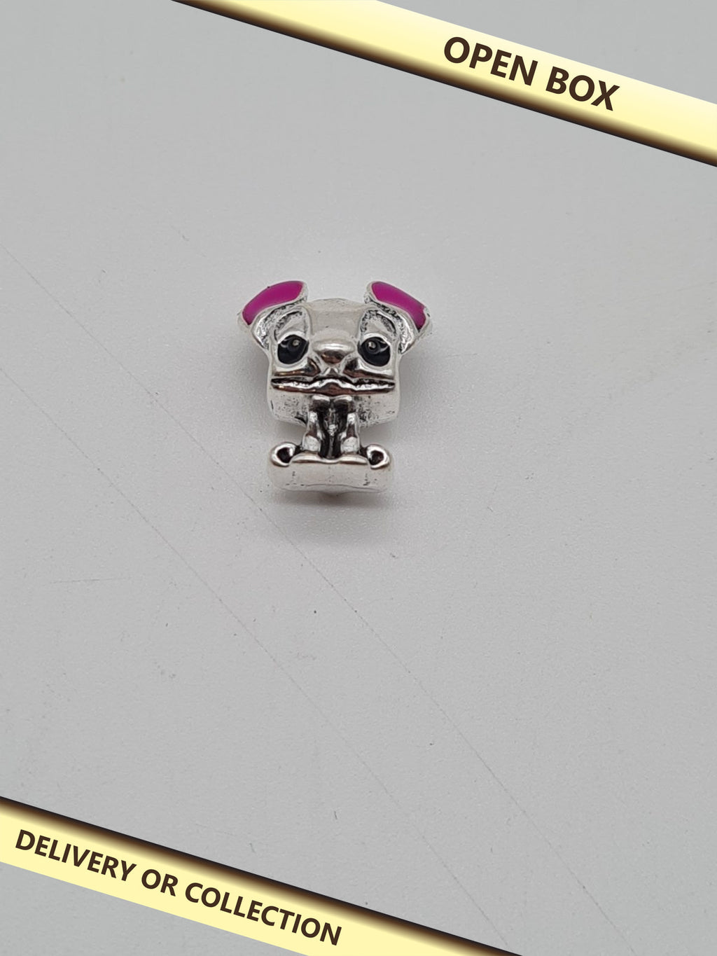 Stitch Character Bracelet Charm — photograph 1 — Open box; auction delivery information shown on image