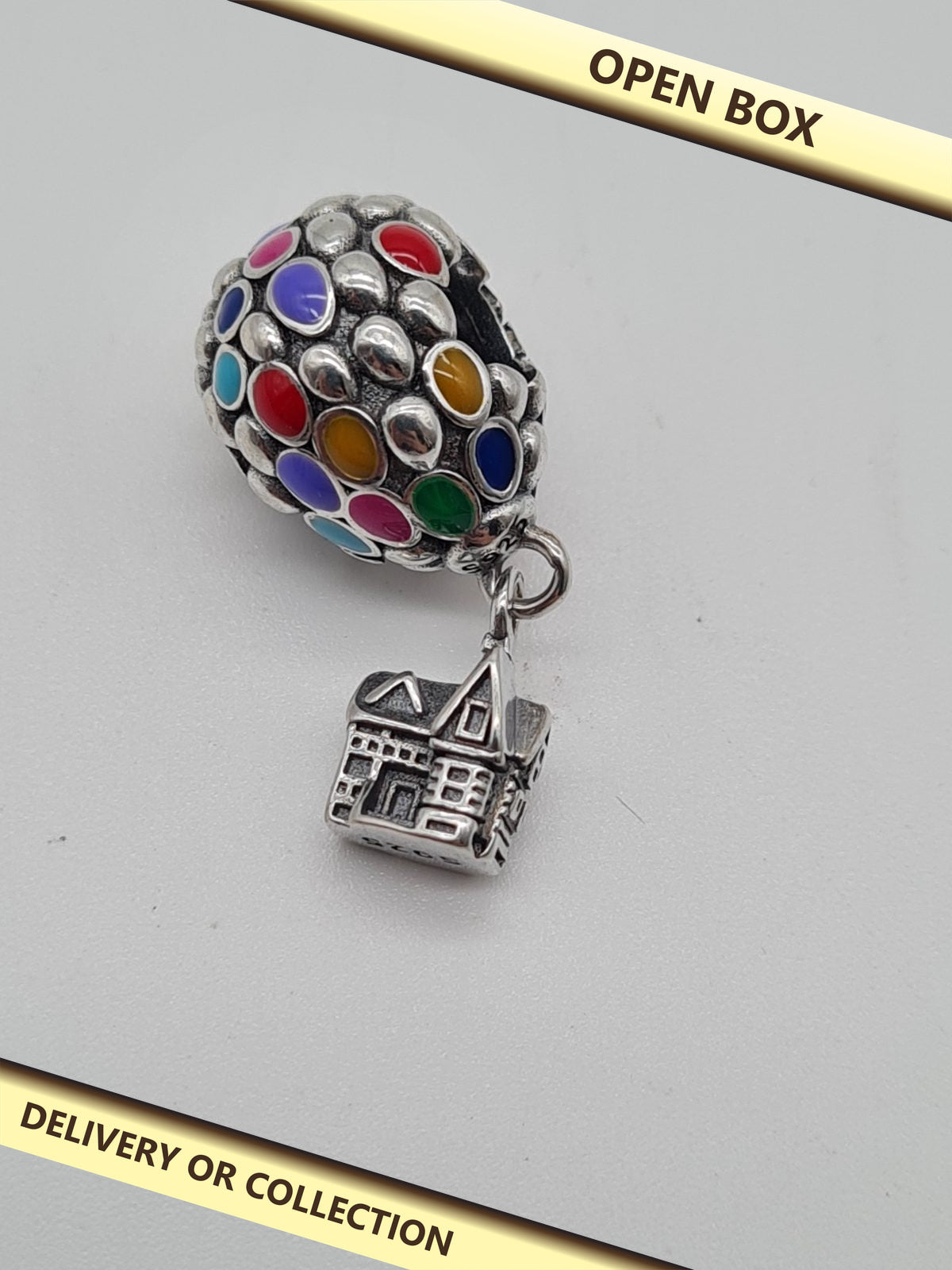 Balloon and House Dangle Bracelet Charm — photograph 1 — Open box; auction delivery information shown on image