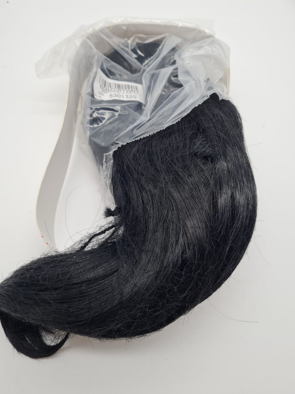 Short black curled hair piece — photograph 3