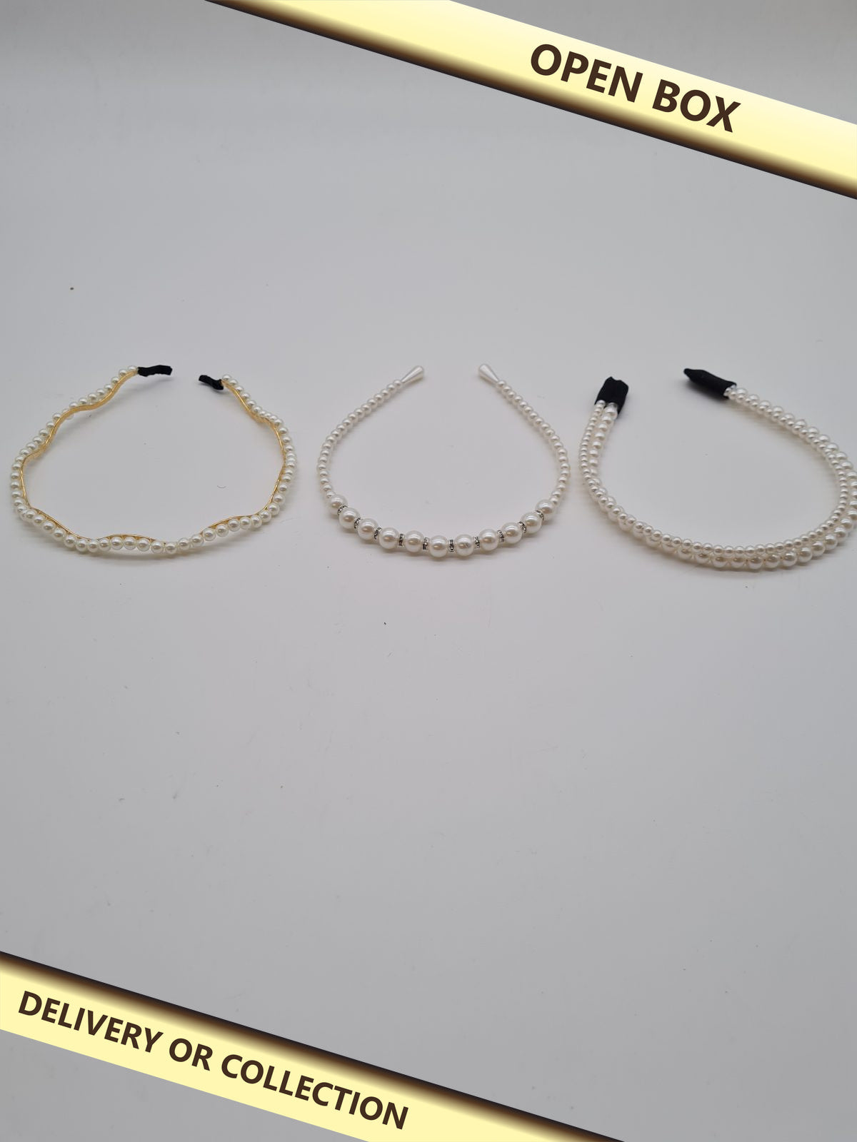 Set of 3 Pearl-Effect Fashion Headbands — photograph 1 — Open box; auction delivery information shown on image