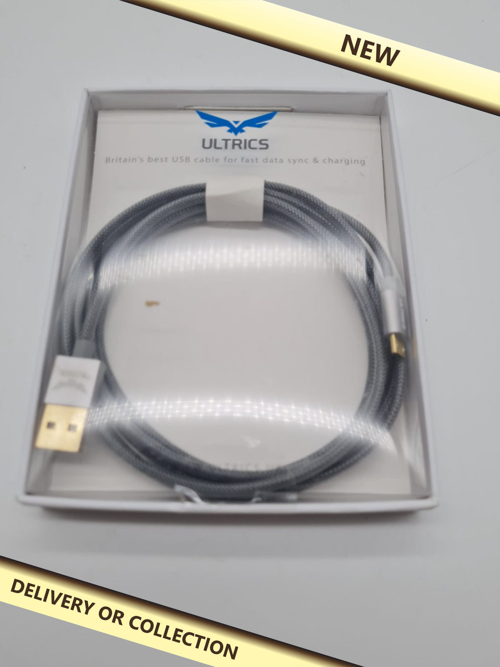 USB-A to Micro-USB Cable — photograph 1 — New; auction delivery information shown on image