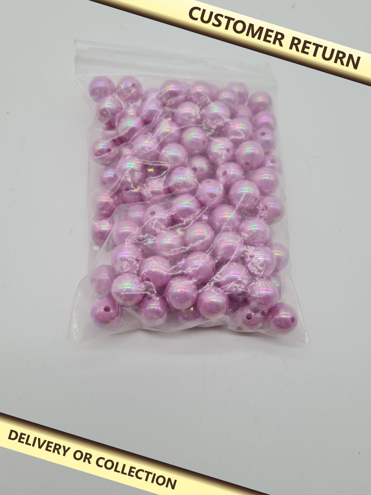 Purple Iridescent Round Acrylic Beads — photograph 1 — Customer return; auction delivery information shown on image