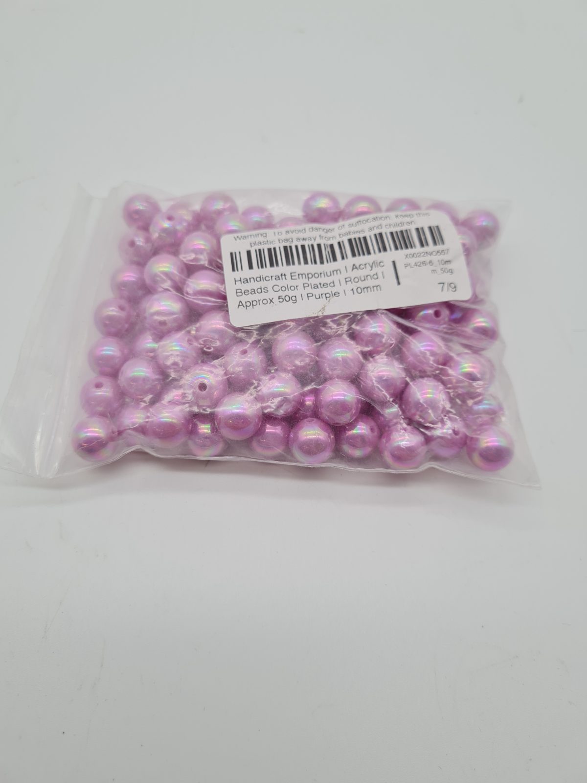 Purple Iridescent Round Acrylic Beads — photograph 2