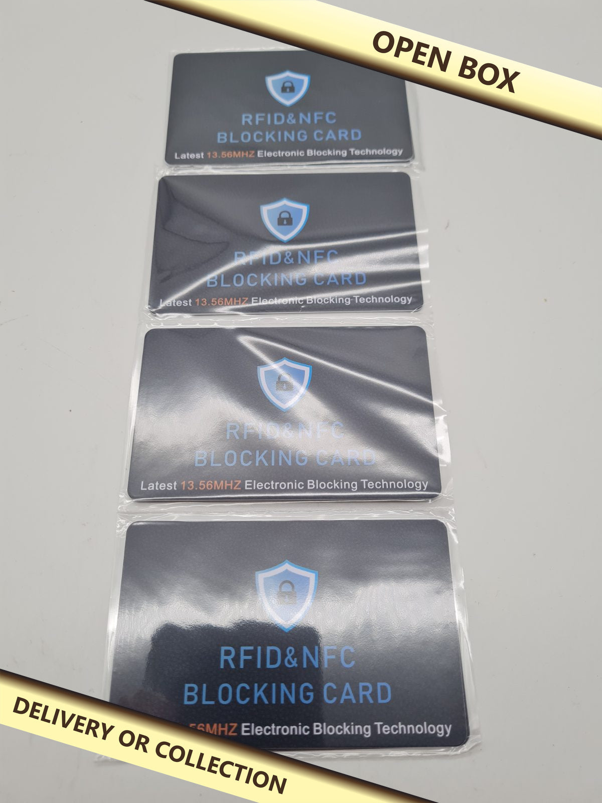 RFID & NFC Blocking Cards pack of 4 — photograph 1 — Open box; auction delivery information shown on image