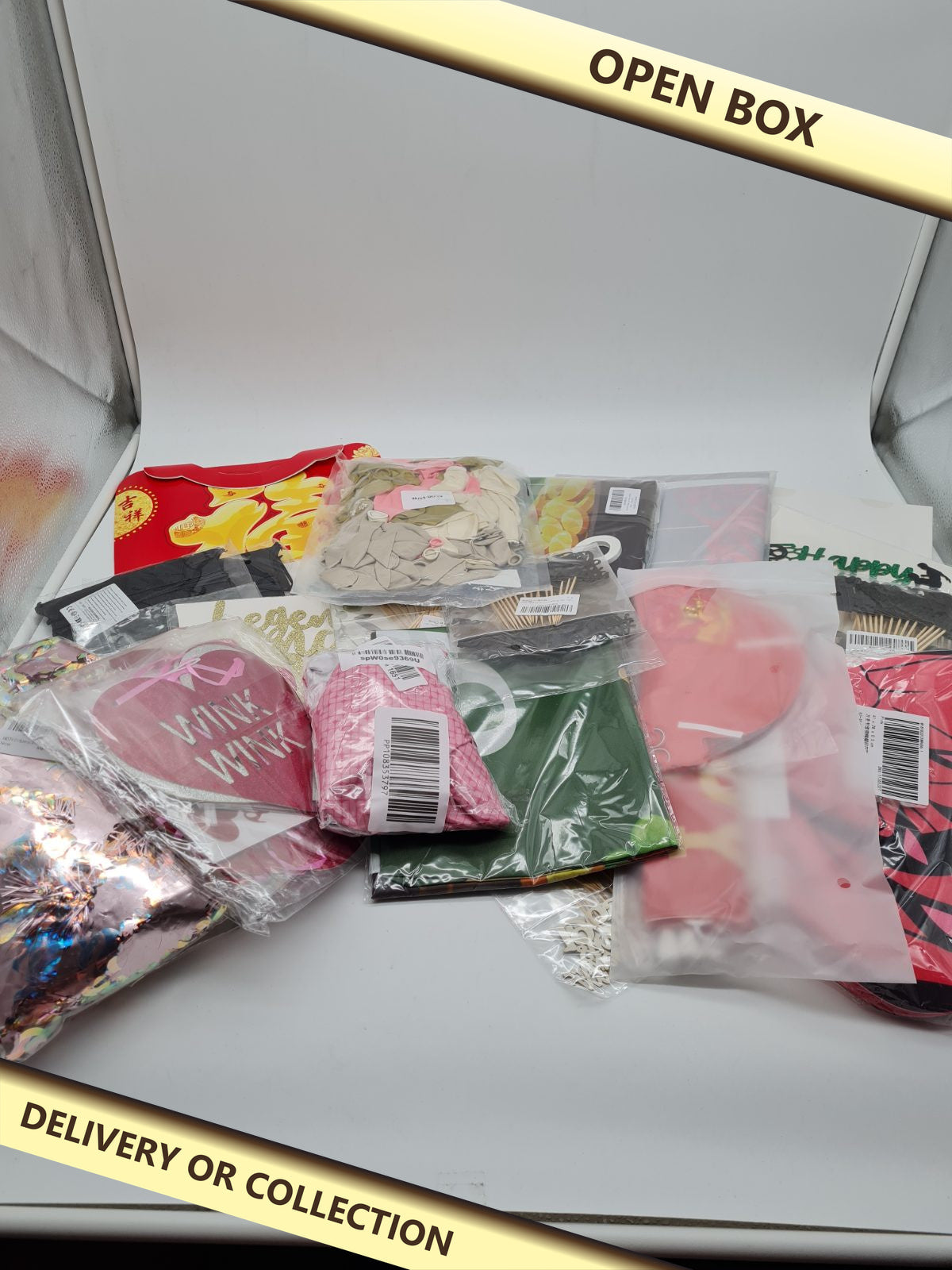 Party bundles box — photograph 1 — Open box; auction delivery information shown on image