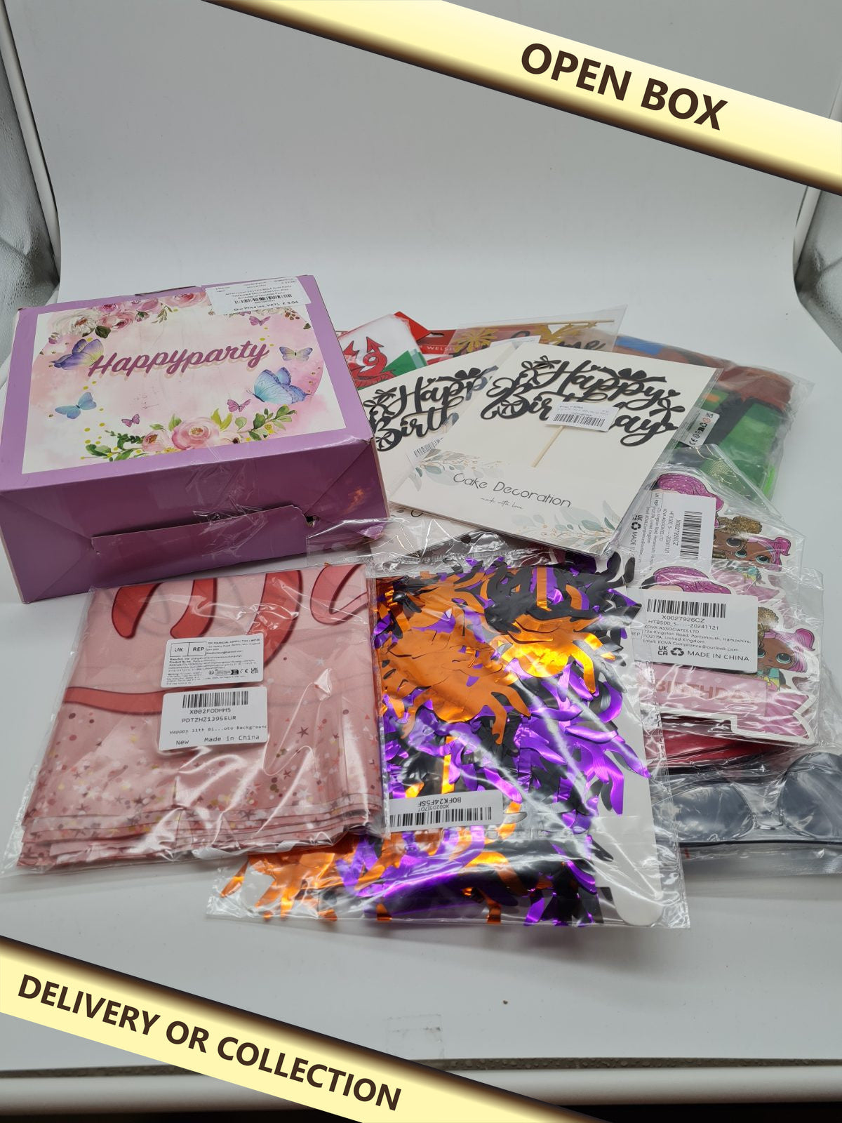 Party box bundle — photograph 1 — Open box; auction delivery information shown on image