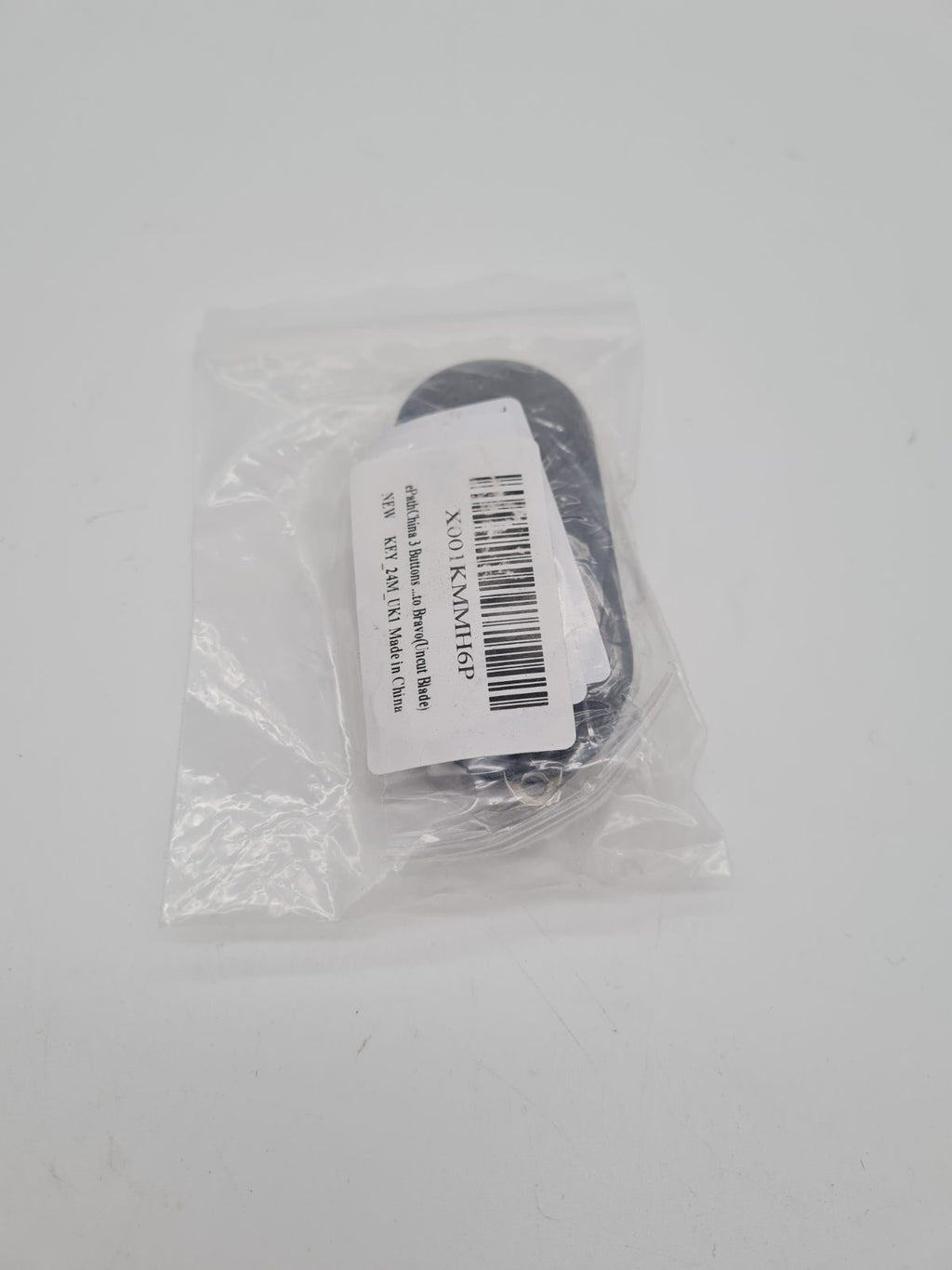 Three-Button Car Key Fob Shell with Uncut Blade — photograph 4