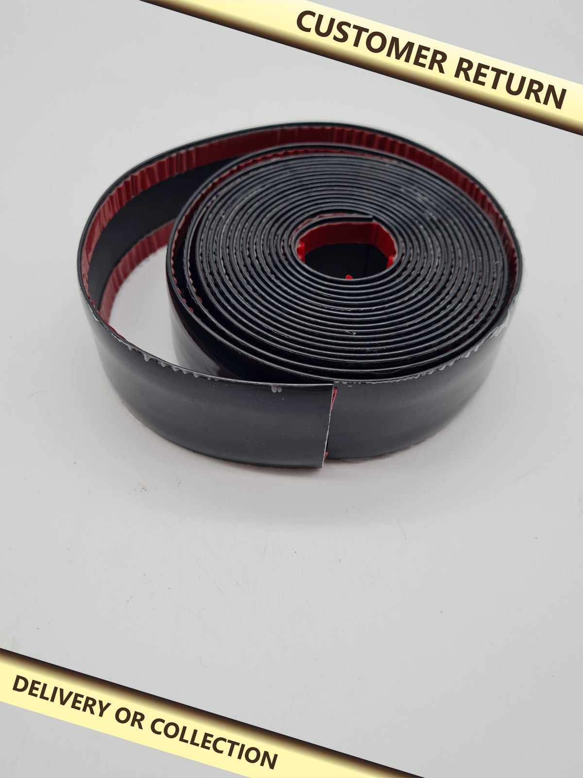 Flexible self-adhesive car trim strip — photograph 1 — Customer return; auction delivery information shown on image