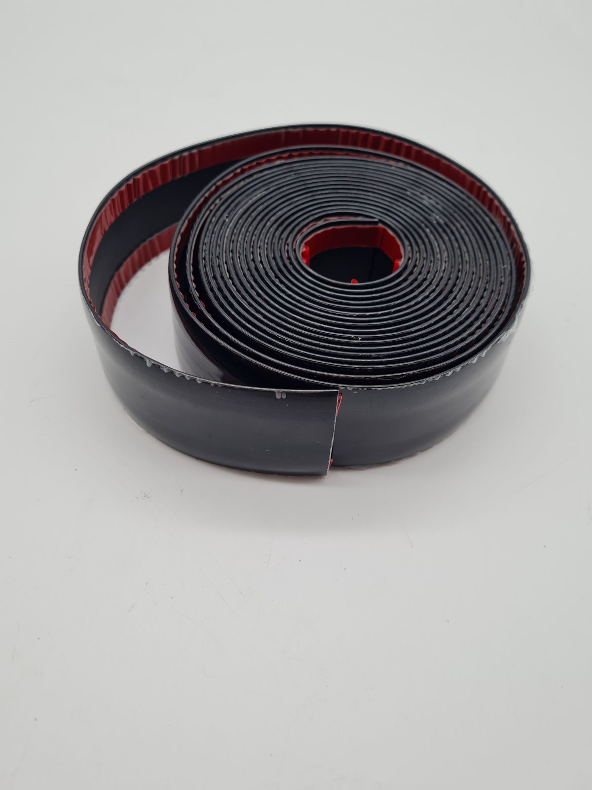 Flexible self-adhesive car trim strip — photograph 1