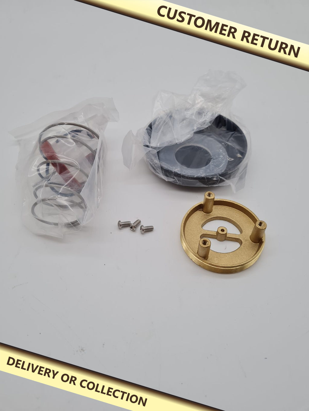 Spring-Loaded Pop-Up Waste Plug Repair Kit — photograph 1 — Customer return; auction delivery information shown on image